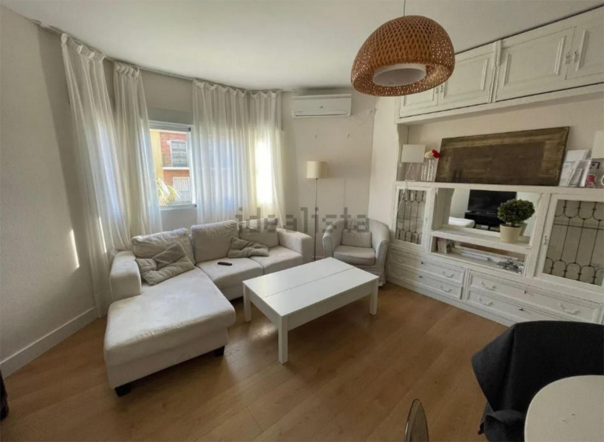 Pis per a compartir a Calle Castillo de Aroche, 2, Bami - La Estrella Sala d'estar de Pis per a compartir en Sevilla Capital amb Aire condicionat, Parquet i Moblat