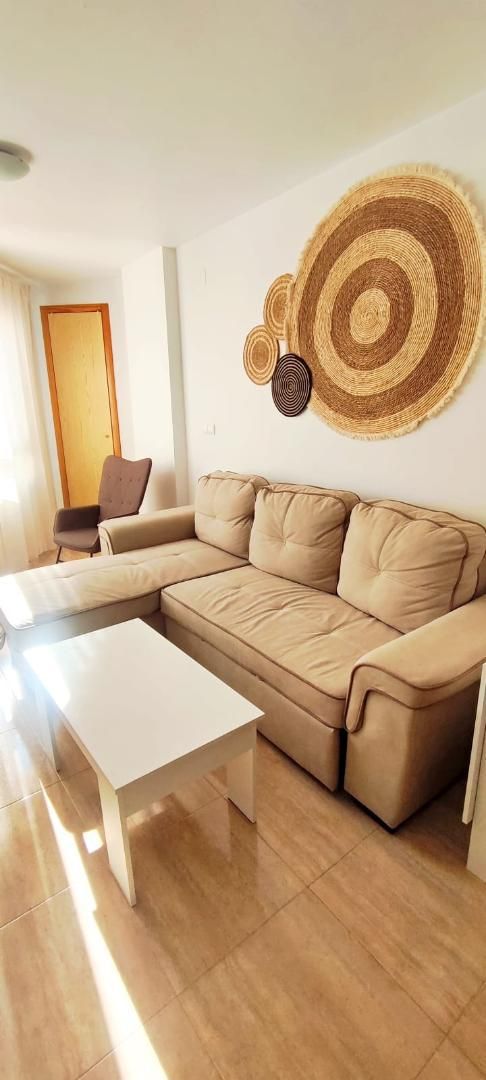 Living room of Flat to rent in Torrevieja  with Air Conditioner and Swimming Pool