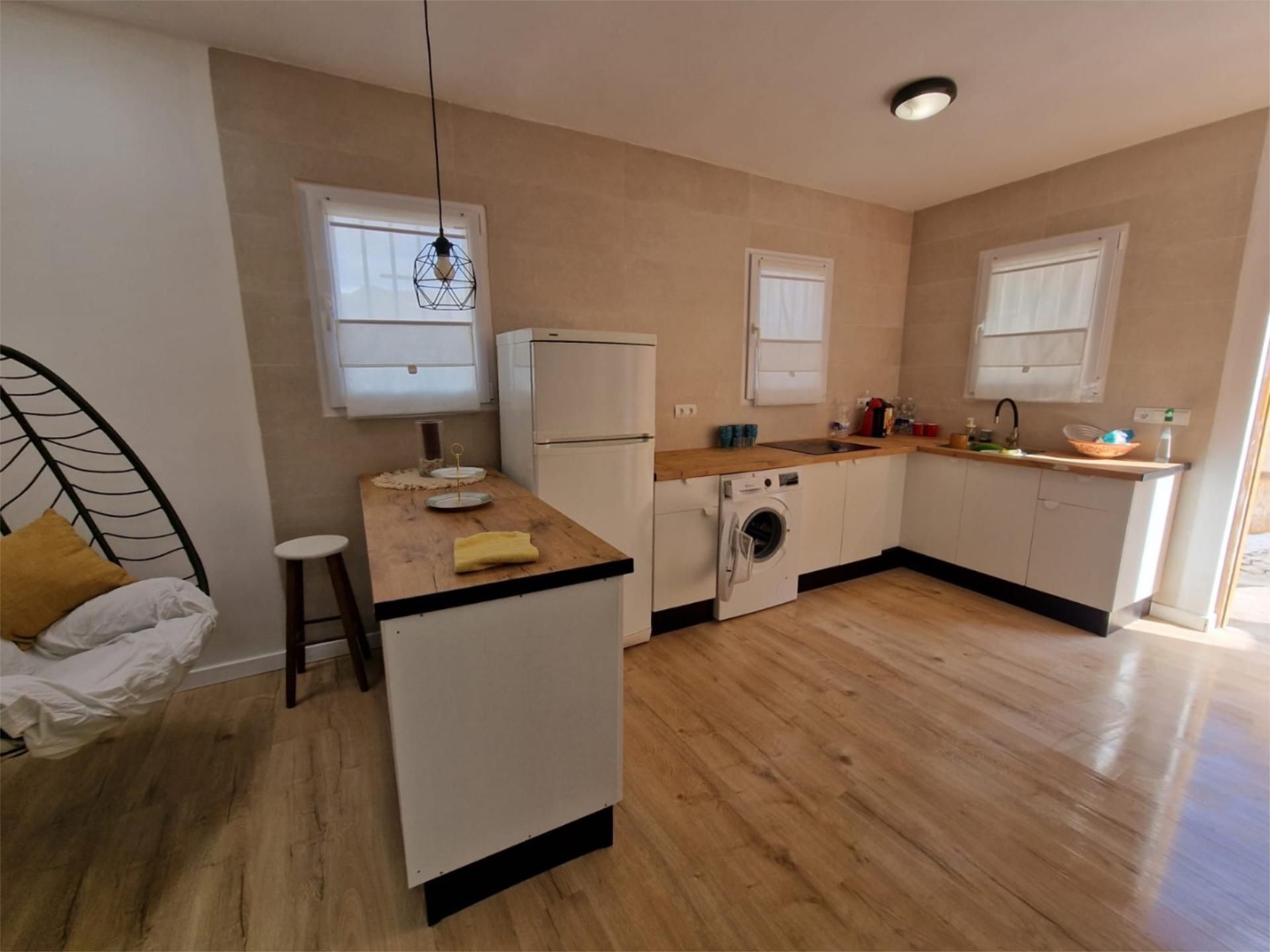 Kitchen of Planta baja to rent in Alboloduy  with Parquet flooring, Swimming Pool and Furnished