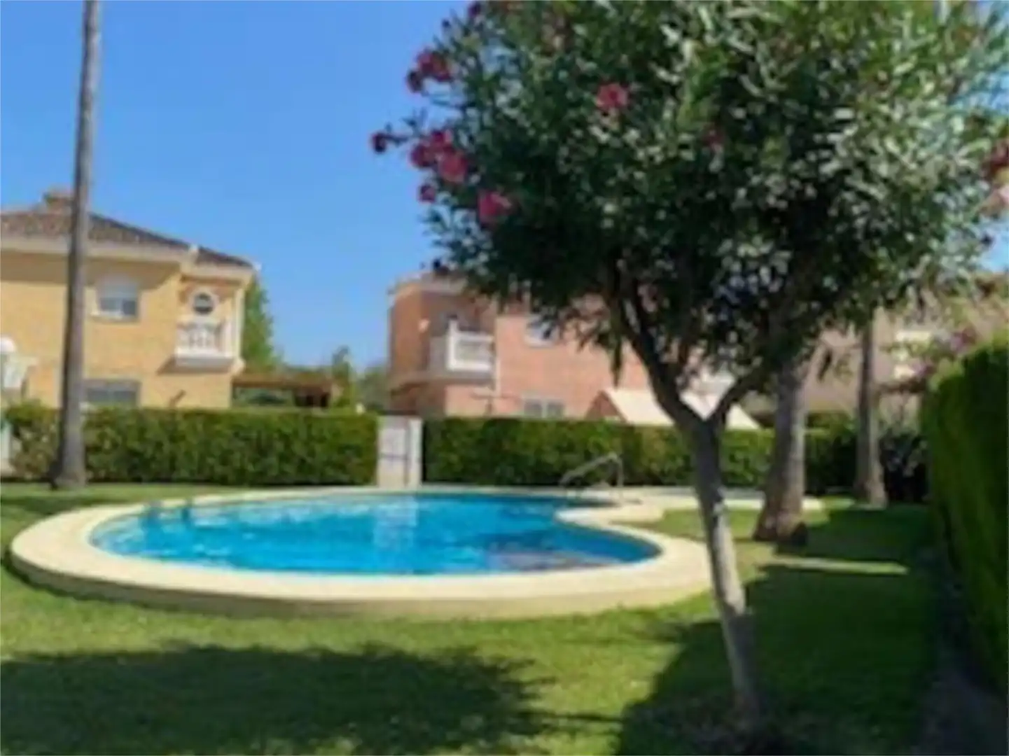 Casa adosada en venta en Avinguda de Gaudi, 9, Oliva Nova Vista exterior de Casa adosada en venta en Oliva con Aire acondicionado, Terraza y Piscina