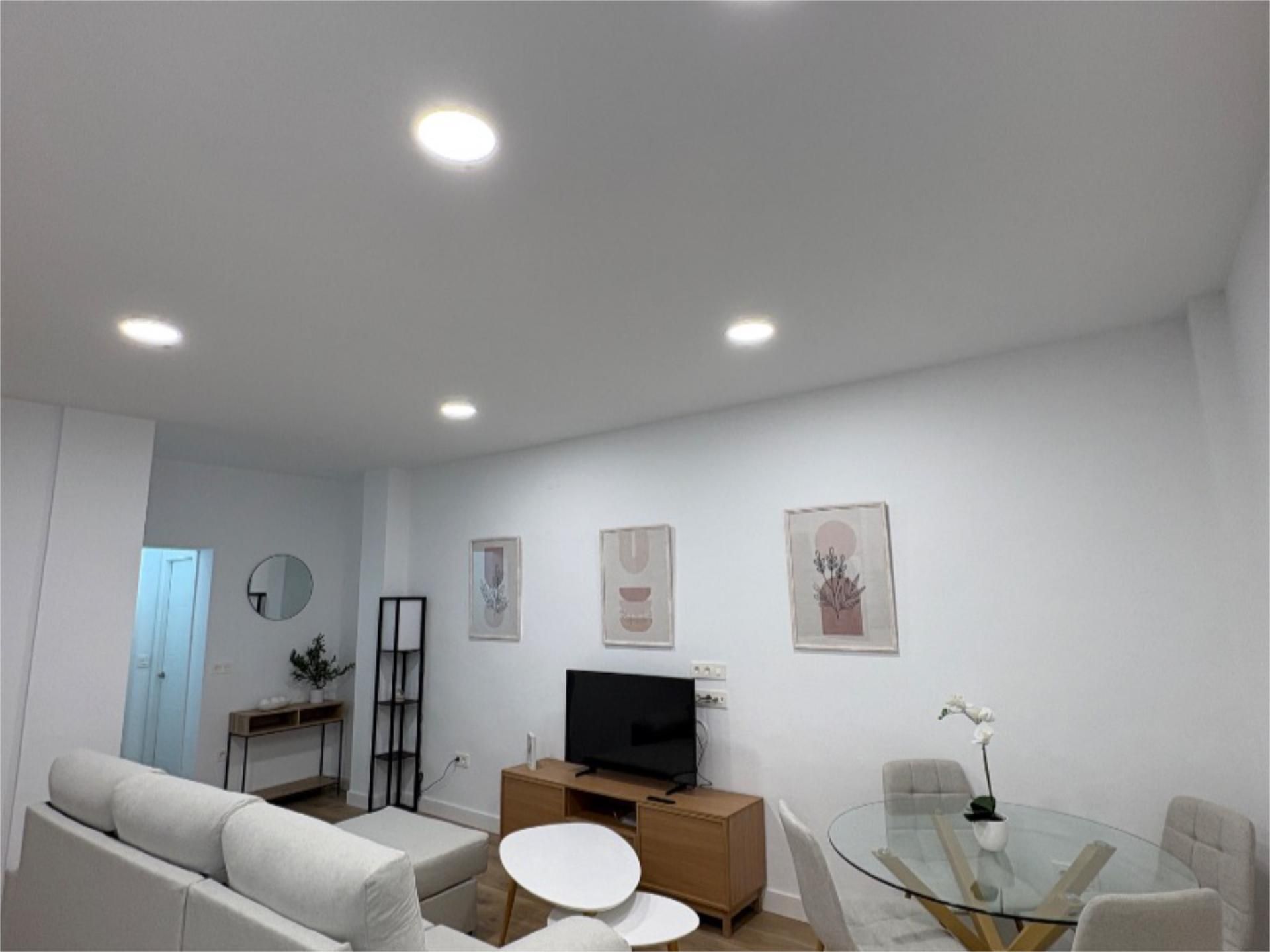 Living room of Flat to rent in Armilla  with Air Conditioner, Private garden and Storage room