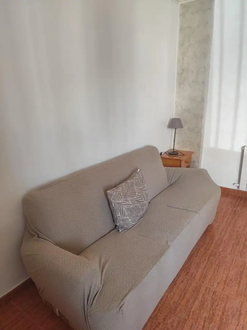 Sala de estar de Casa adosada en venta en Campillo de Altobuey con Aire acondicionado, Calefacción y Amueblado