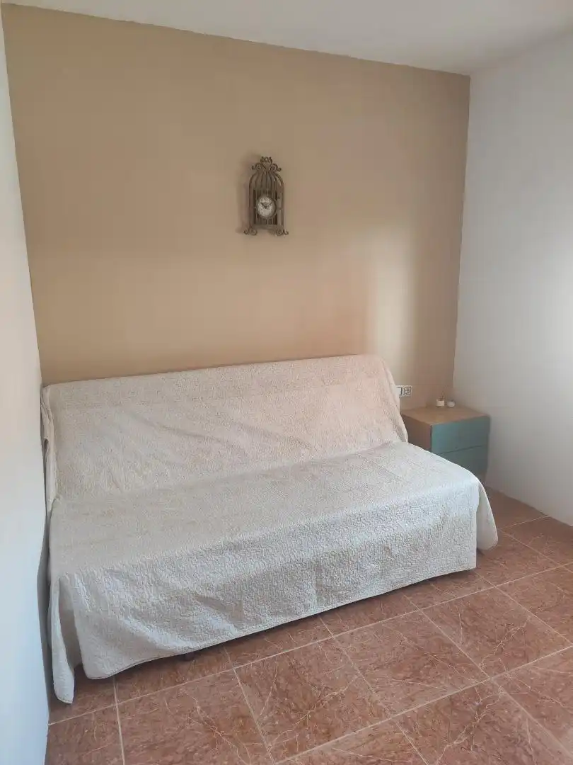 Habitación de Casa adosada en venta en Campillo de Altobuey con Aire acondicionado, Calefacción y Amueblado