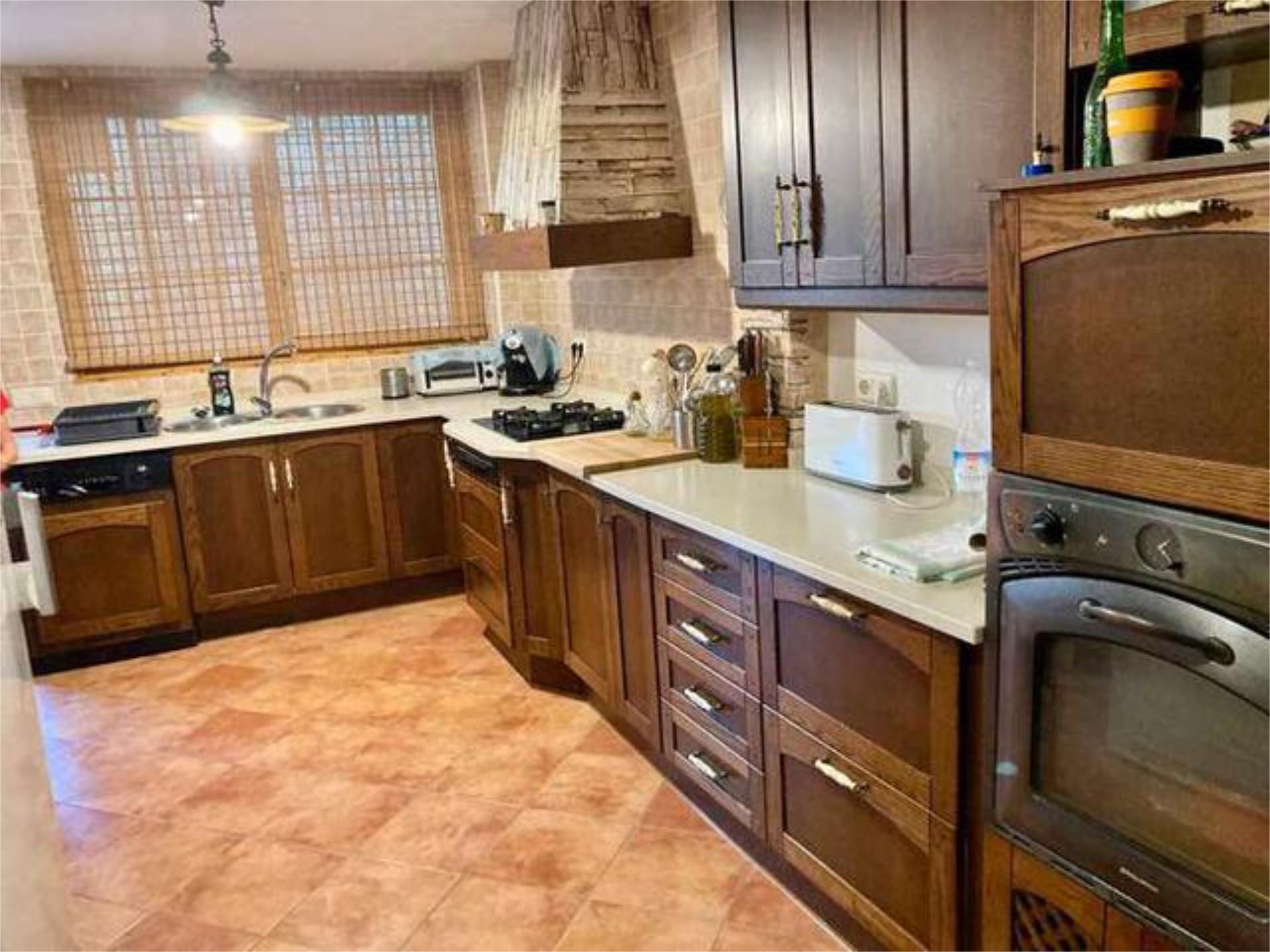 Casa adosada en venda a Puente Tablas - Puente Nuevo - Cerro Molina Cuina de Casa adosada en venda en Jaén Capital amb Terrassa i Piscina