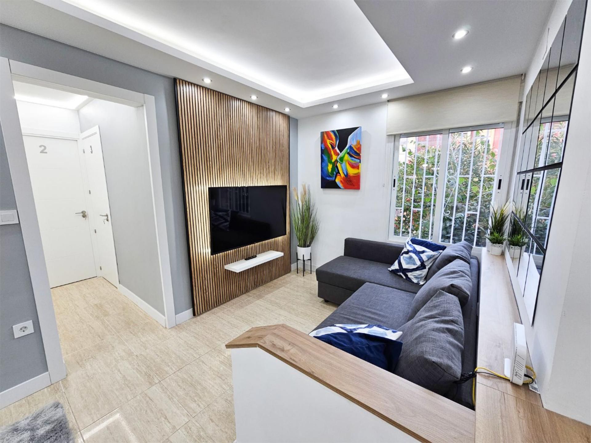 Living room of Flat to share in  Granada Capital  with Heating, Terrace and Furnished