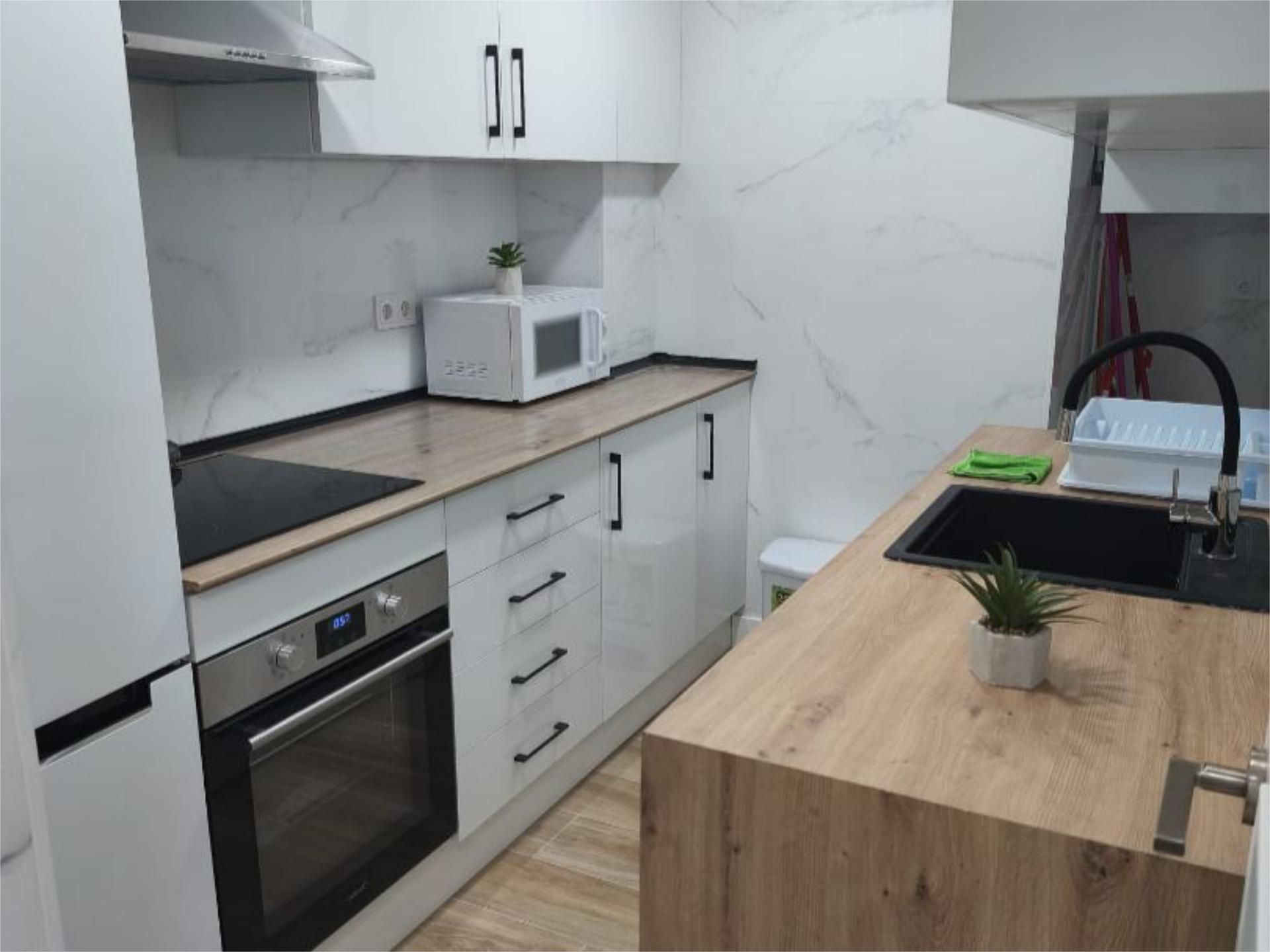 Pis de lloguer a Avenida 28 Febrero, 69, Barrio Alto Cuina de Pis de lloguer en San Juan de Aznalfarache amb Calefacció, Moblat i Balcó