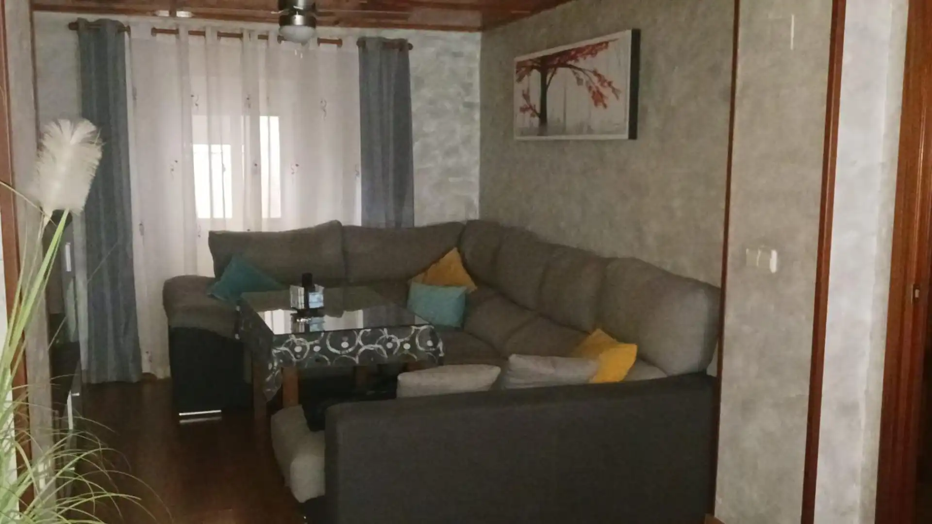 Living room of Single-family semi-detached for sale in Huelma  with Parquet flooring, Furnished and Oven