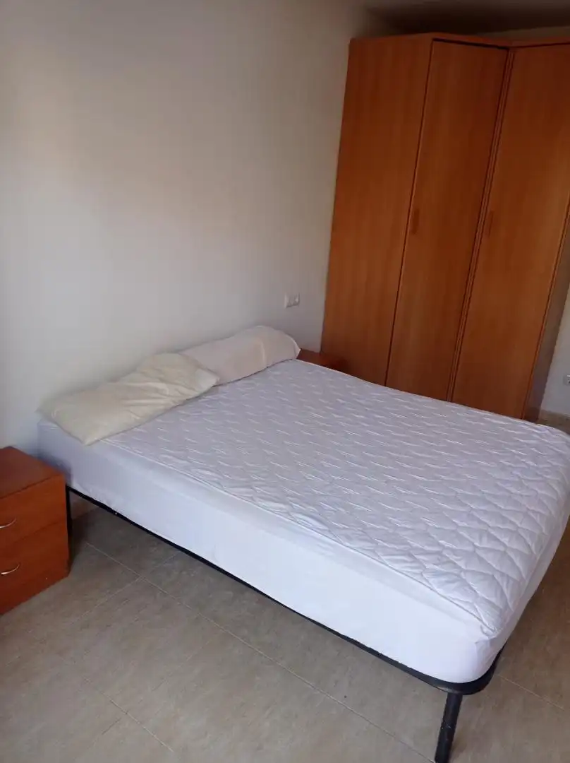 Pis en venda a Carrer Castell de Tamarit, 15, Els Tallats - Mas Olivé Dormitori de Pis en venda en Cambrils amb Aire condicionat, Terrassa i Piscina