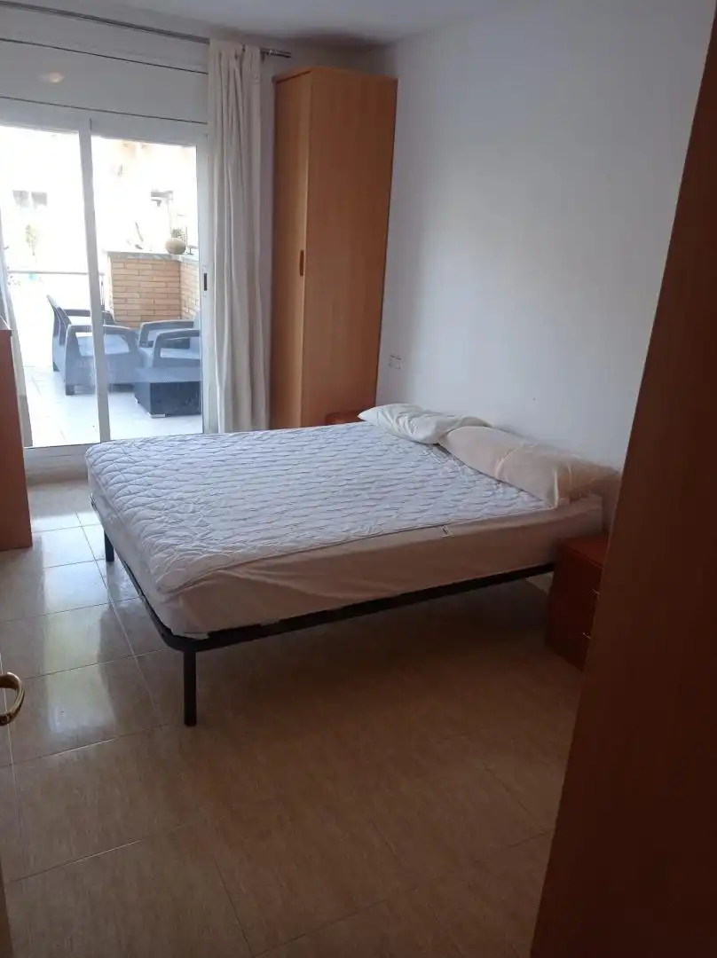 Pis en venda a Carrer Castell de Tamarit, 15, Els Tallats - Mas Olivé Dormitori de Pis en venda en Cambrils amb Aire condicionat, Terrassa i Piscina