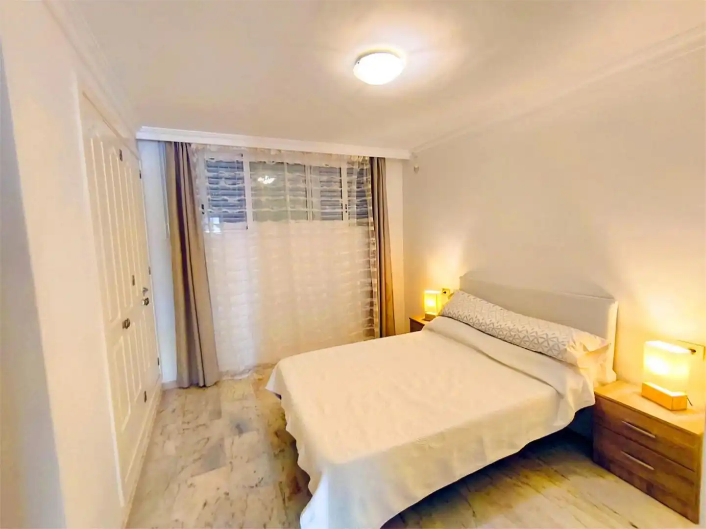Apartament de lloguer a Calle Petunia, 3, Puerto de Santiago Dormitori de Apartament de lloguer en Santiago del Teide amb Aire condicionat, Terrassa i Piscina