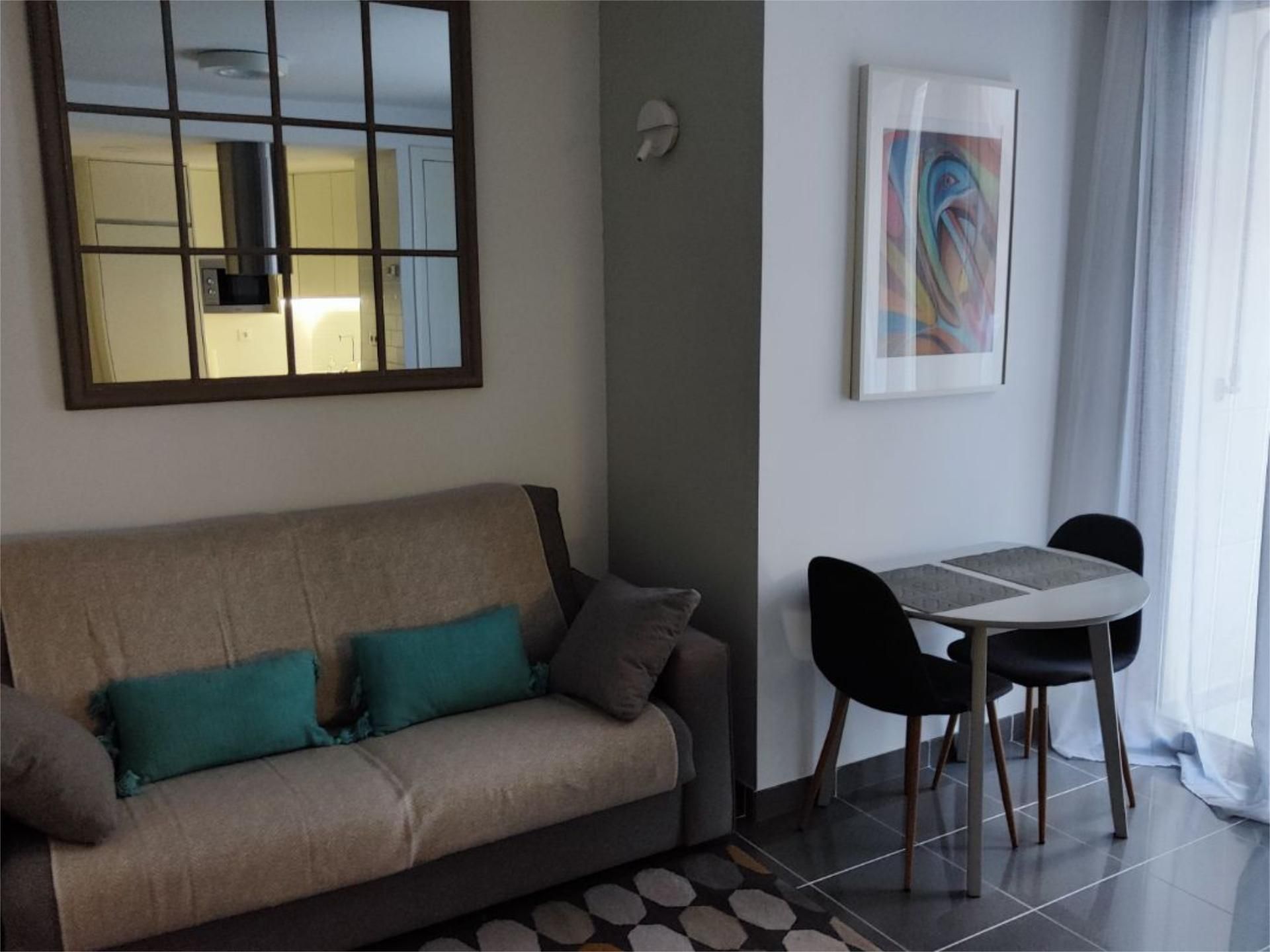 Sala d'estar de Pis de lloguer en  Barcelona Capital amb Aire condicionat i Balcó