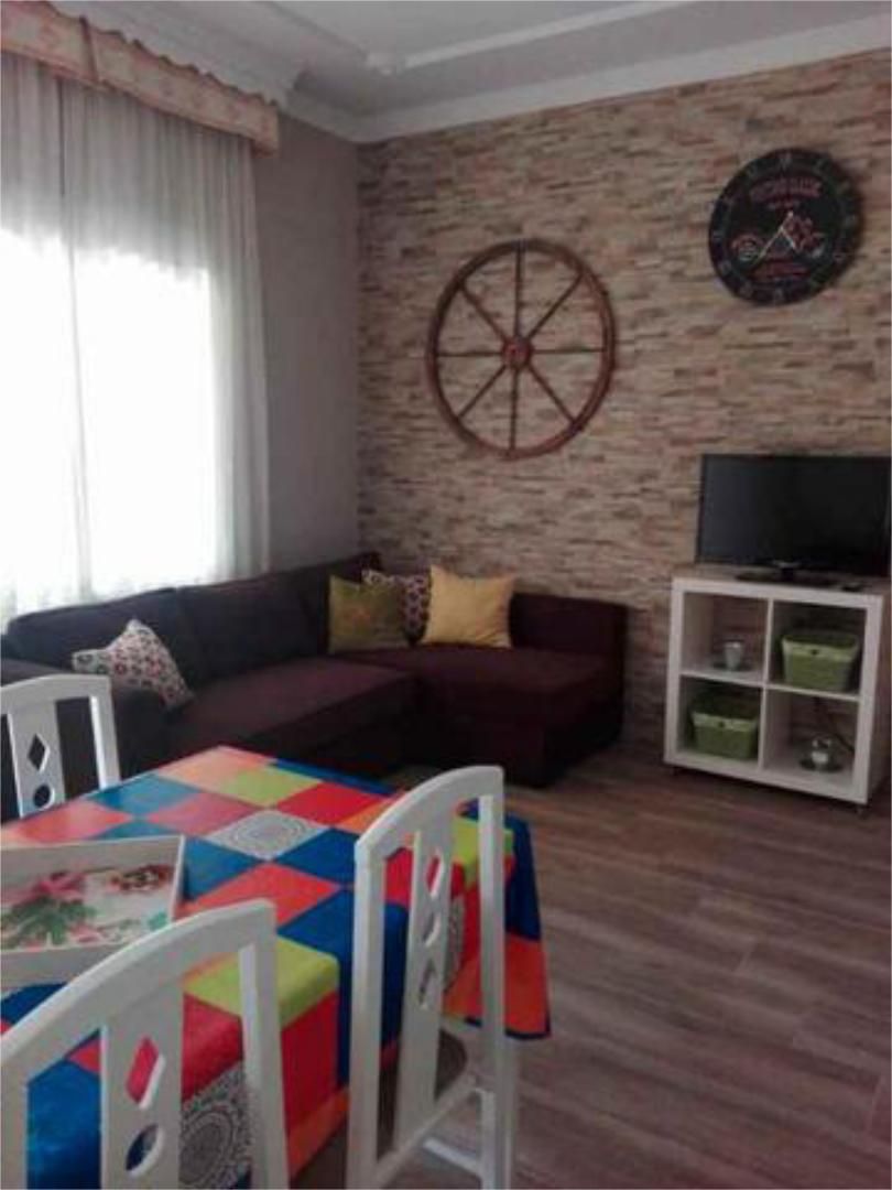 Wohnzimmer von Wohnungen zum verkauf in Nueva Carteya mit Privatgarten, Terrasse und Schwimmbad