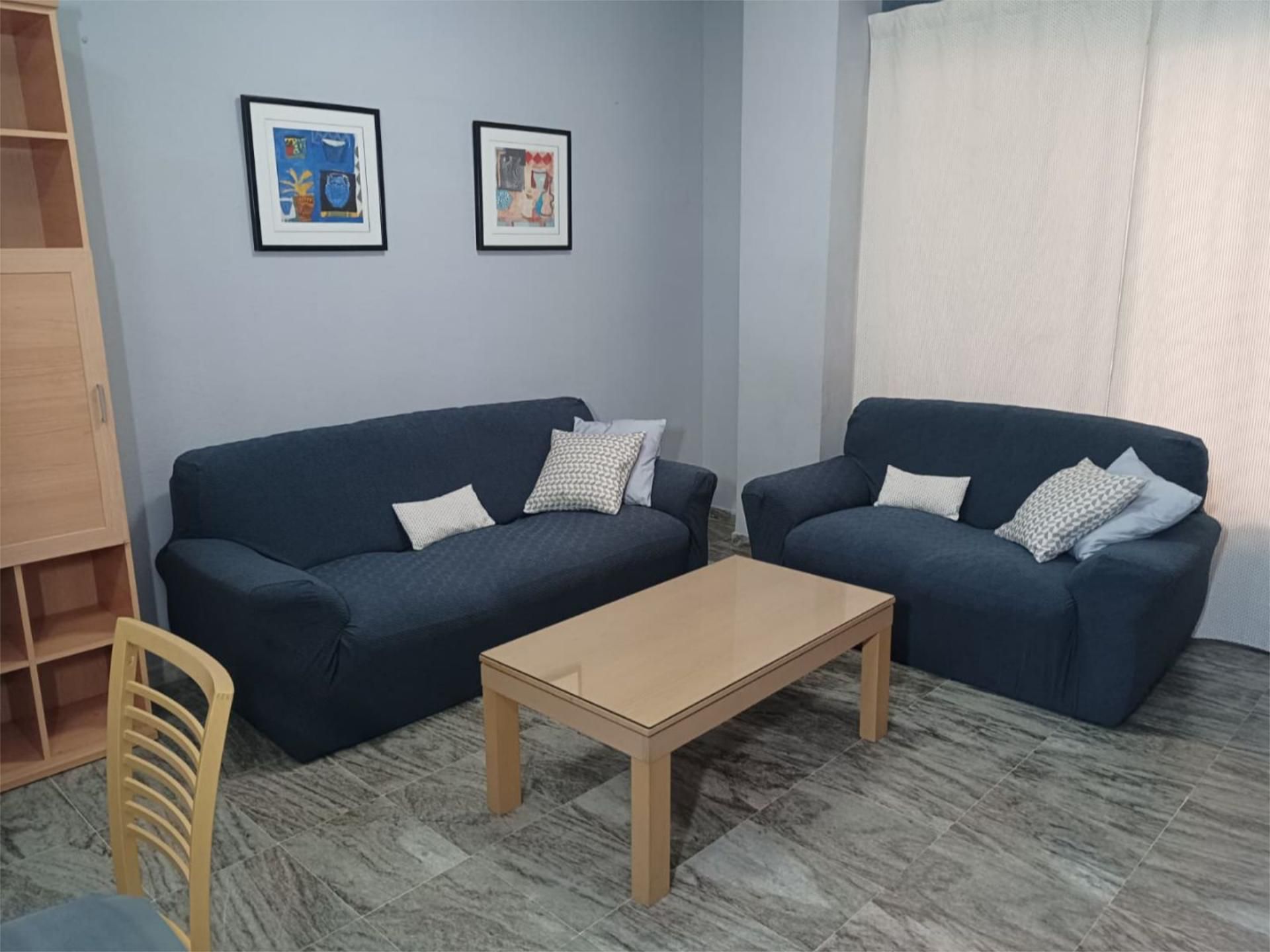 Sala d'estar de Pis de lloguer en  Sevilla Capital amb Aire condicionat, Terrassa i Piscina