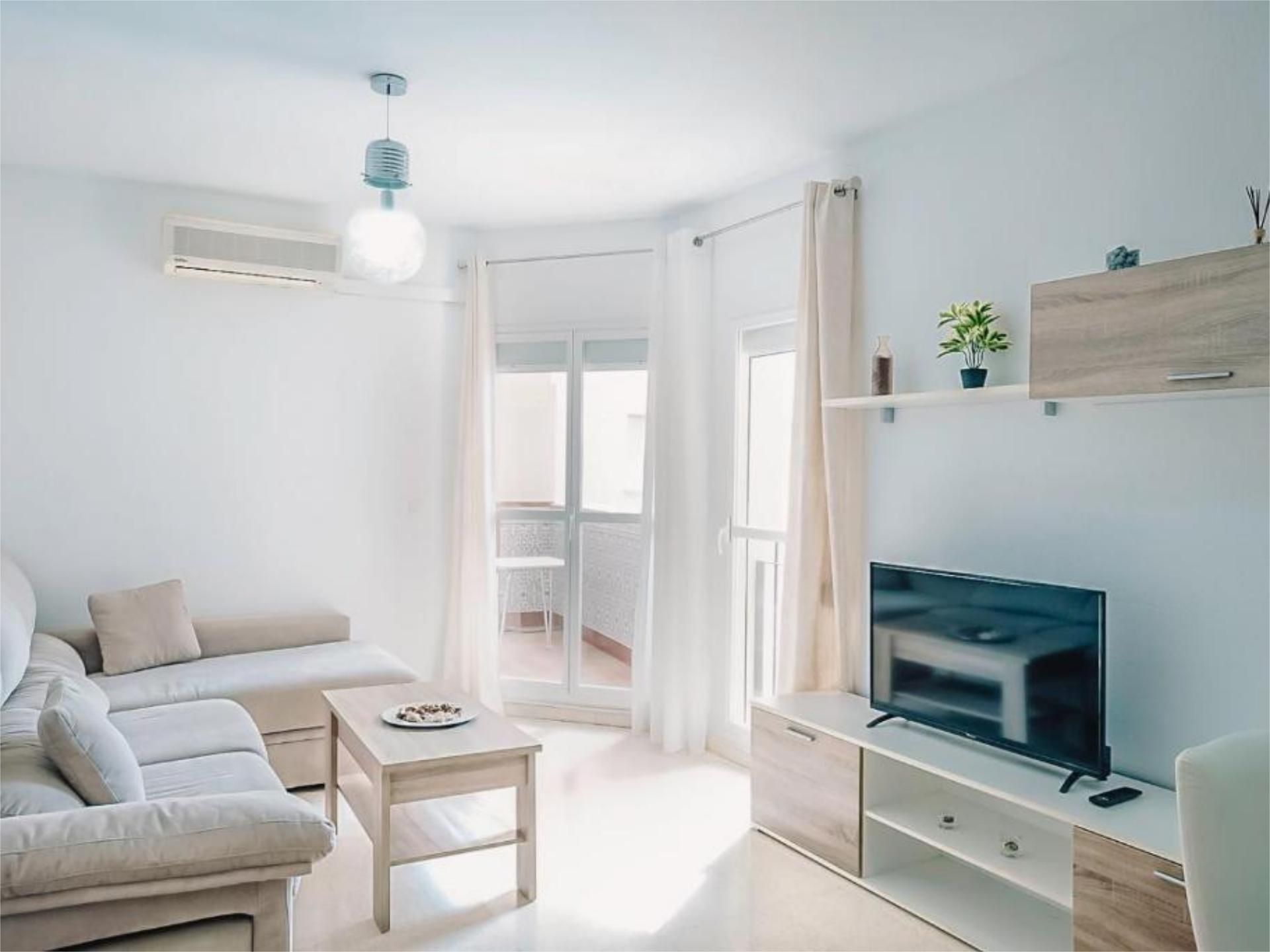 Flat for sale in Calle Domingo Ortega, 21, Los Boliches Living room of Flat for sale in Fuengirola with Air Conditioner, Terrace and Swimming Pool