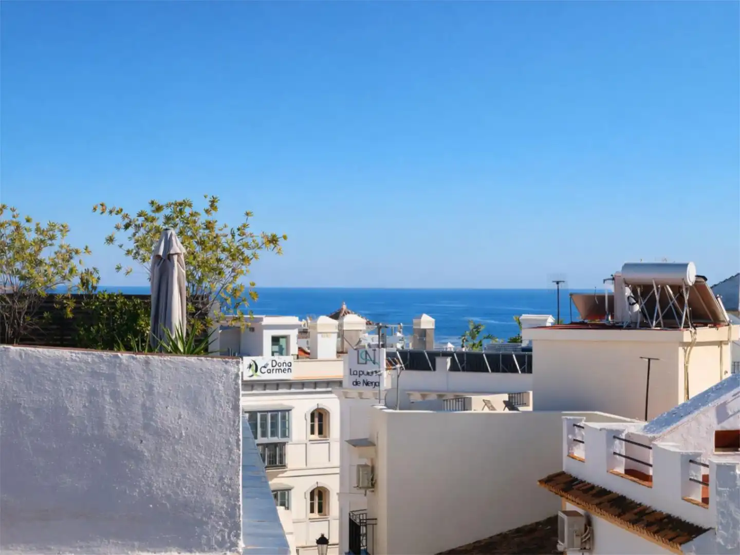 Houses for sale in Plaza de España, 10, Centro Exterior view of Houses for sale in Nerja with Air Conditioner, Heating and Terrace