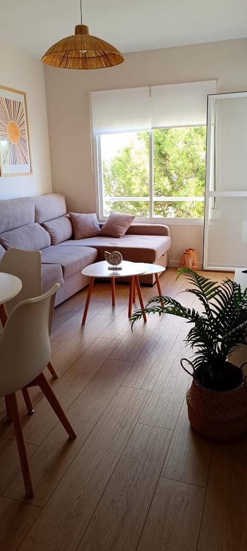 Living room of Flat for sale in Rincón de la Victoria  with Terrace, Swimming Pool and Balcony