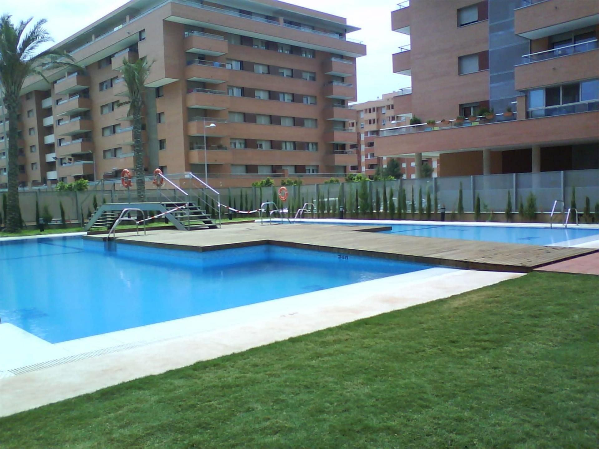 Swimming pool of Flat for sale in  Almería Capital  with Air Conditioner and Oven