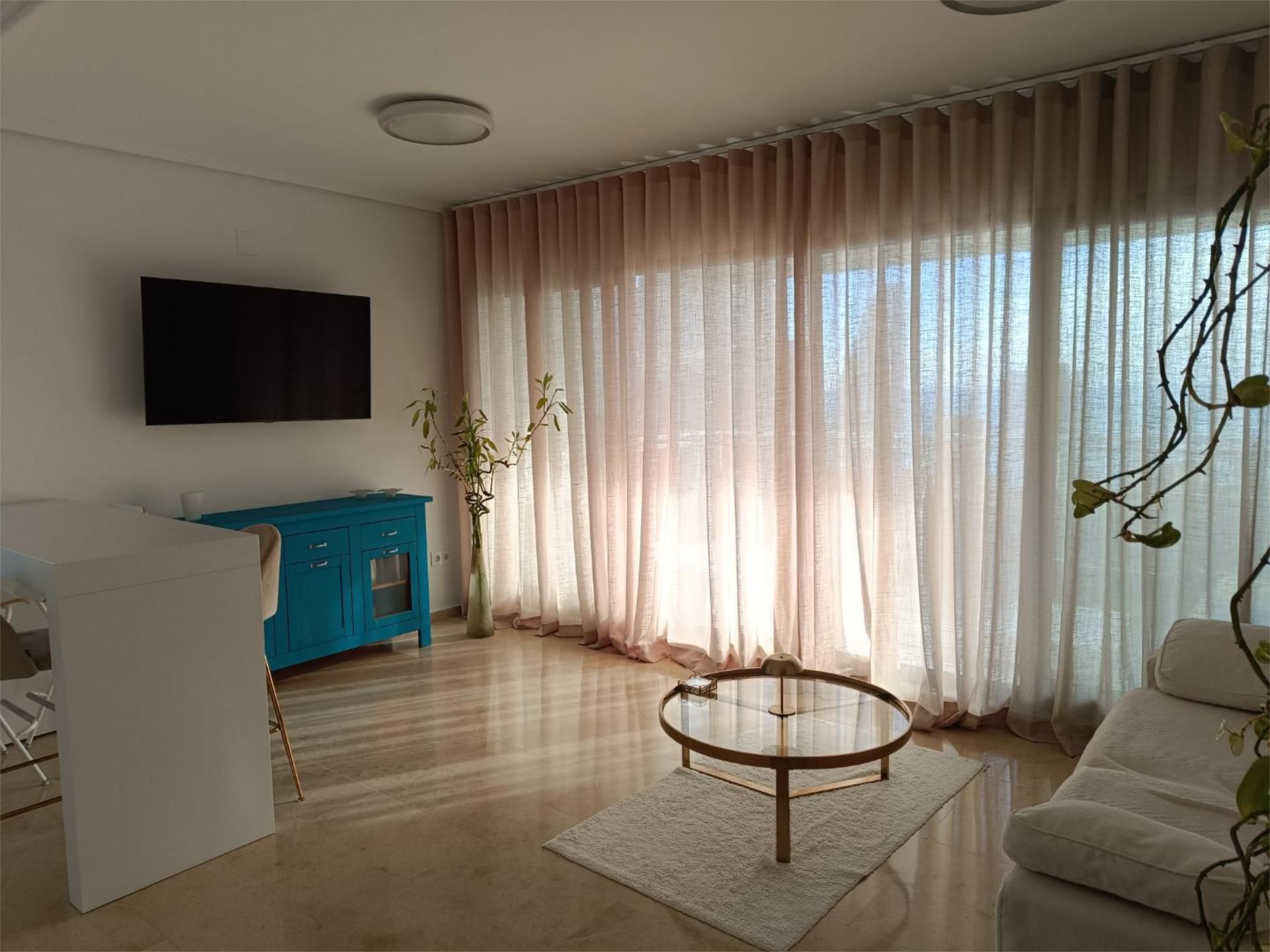 Living room of Flat for sale in Benidorm  with Air Conditioner, Private garden and Parquet flooring