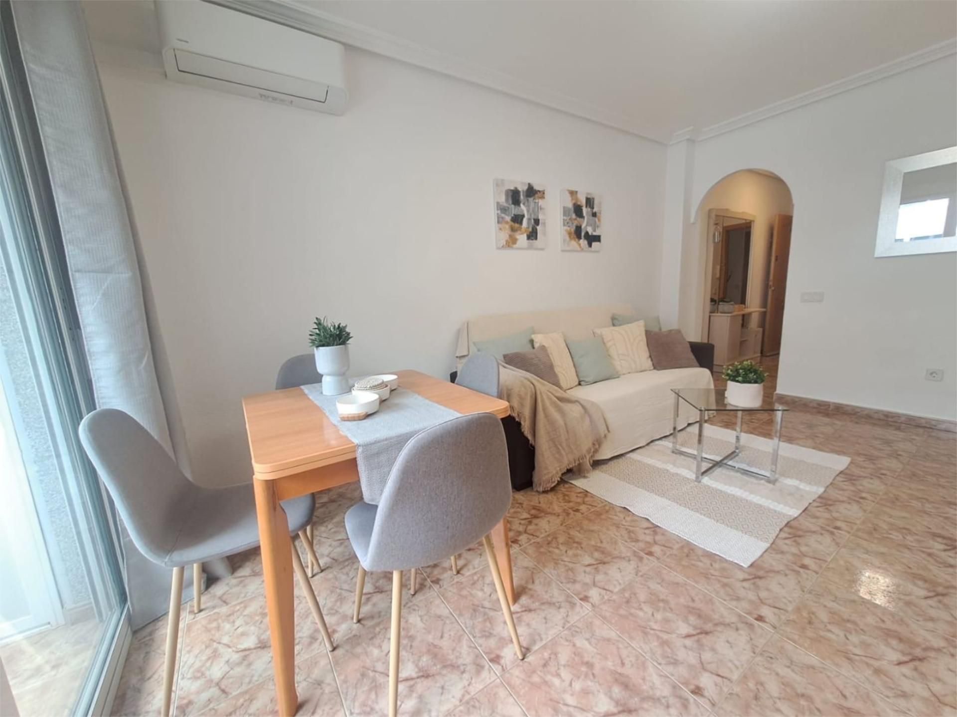 Living room of Flat for sale in Torrevieja  with Air Conditioner and Balcony