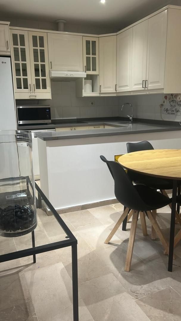 Kitchen of Flat to rent in  Sevilla Capital  with Air Conditioner, Heating and Private garden