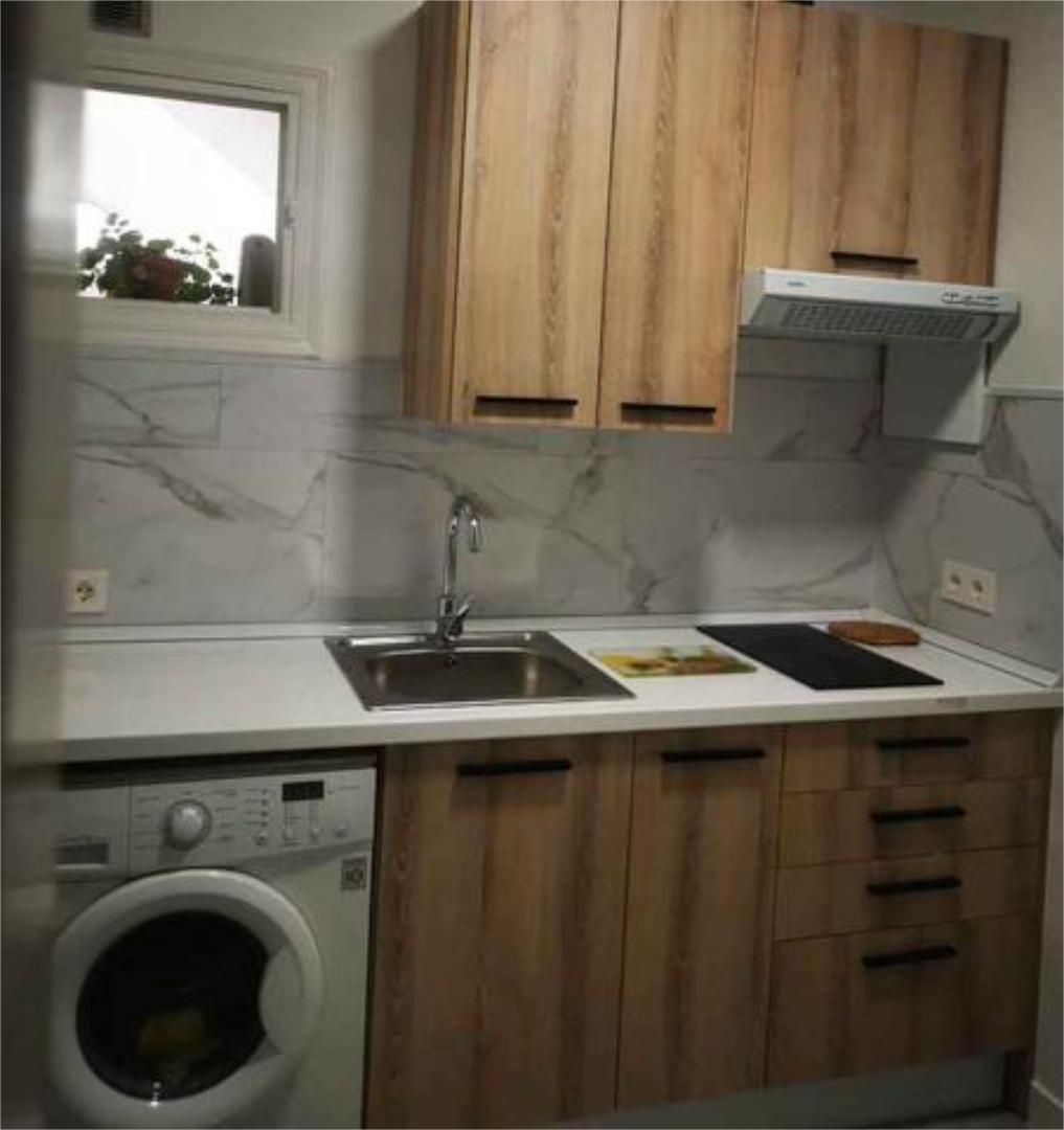 Cuina de Apartament de lloguer en Roquetas de Mar amb Calefacció, Jardí privat i Terrassa