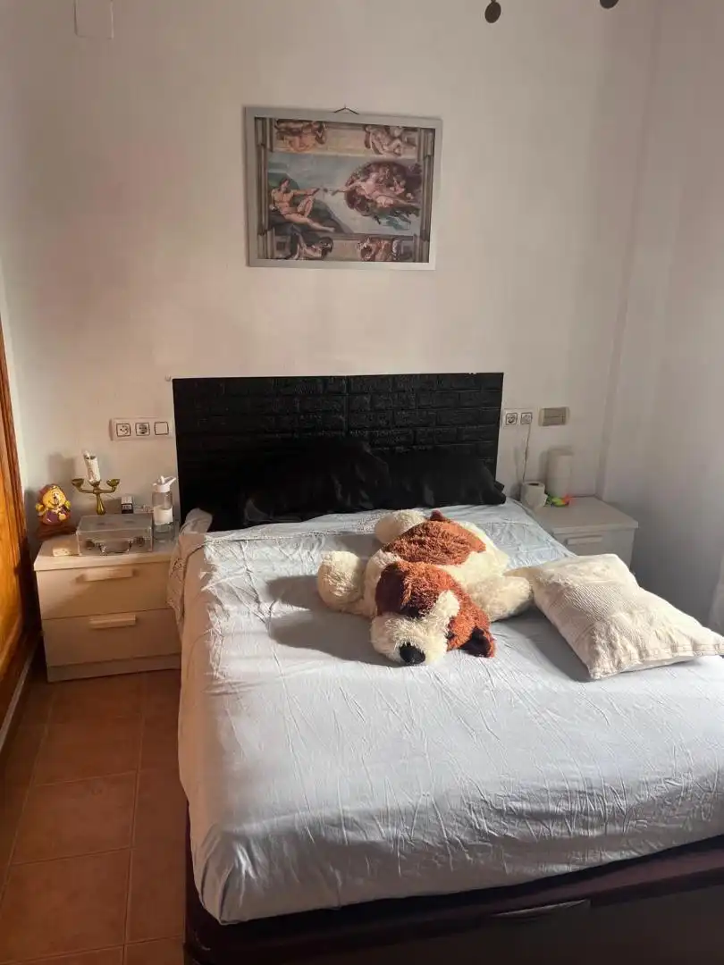 Habitación de Casa adosada en venta en Gines con Aire acondicionado, Calefacción y Jardín privado