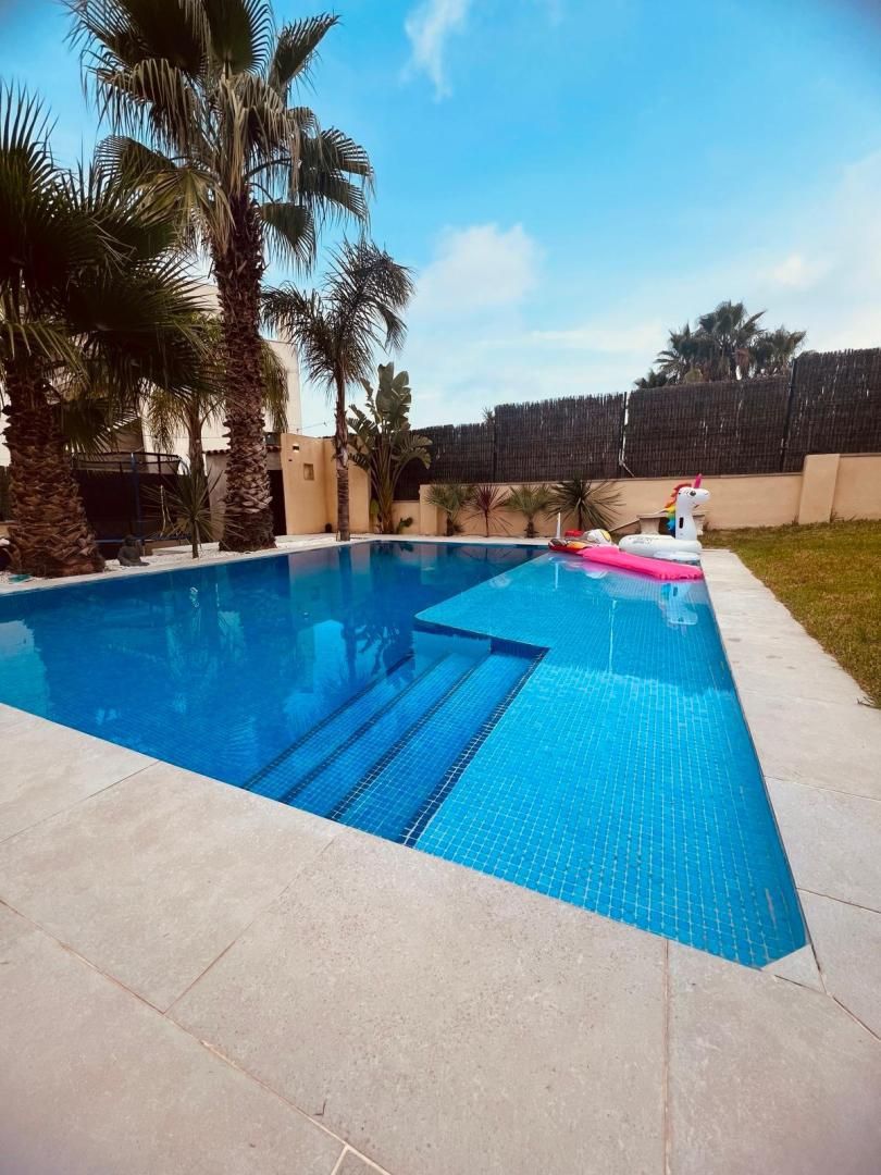 Swimming pool of Single-family semi-detached for sale in Roda de Berà  with Air Conditioner, Terrace and Swimming Pool