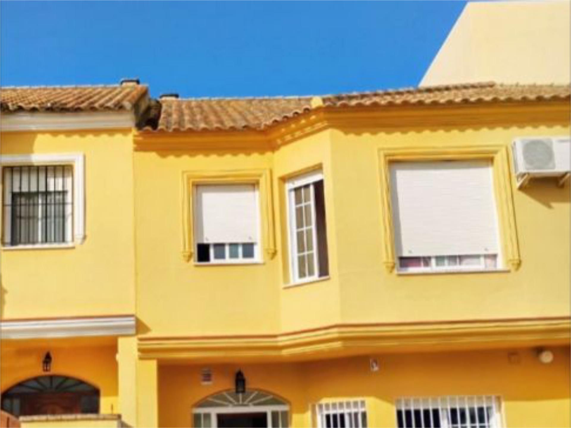 Vista exterior de Casa adosada en venta en Espartinas con Aire acondicionado, Calefacción y Jardín privado