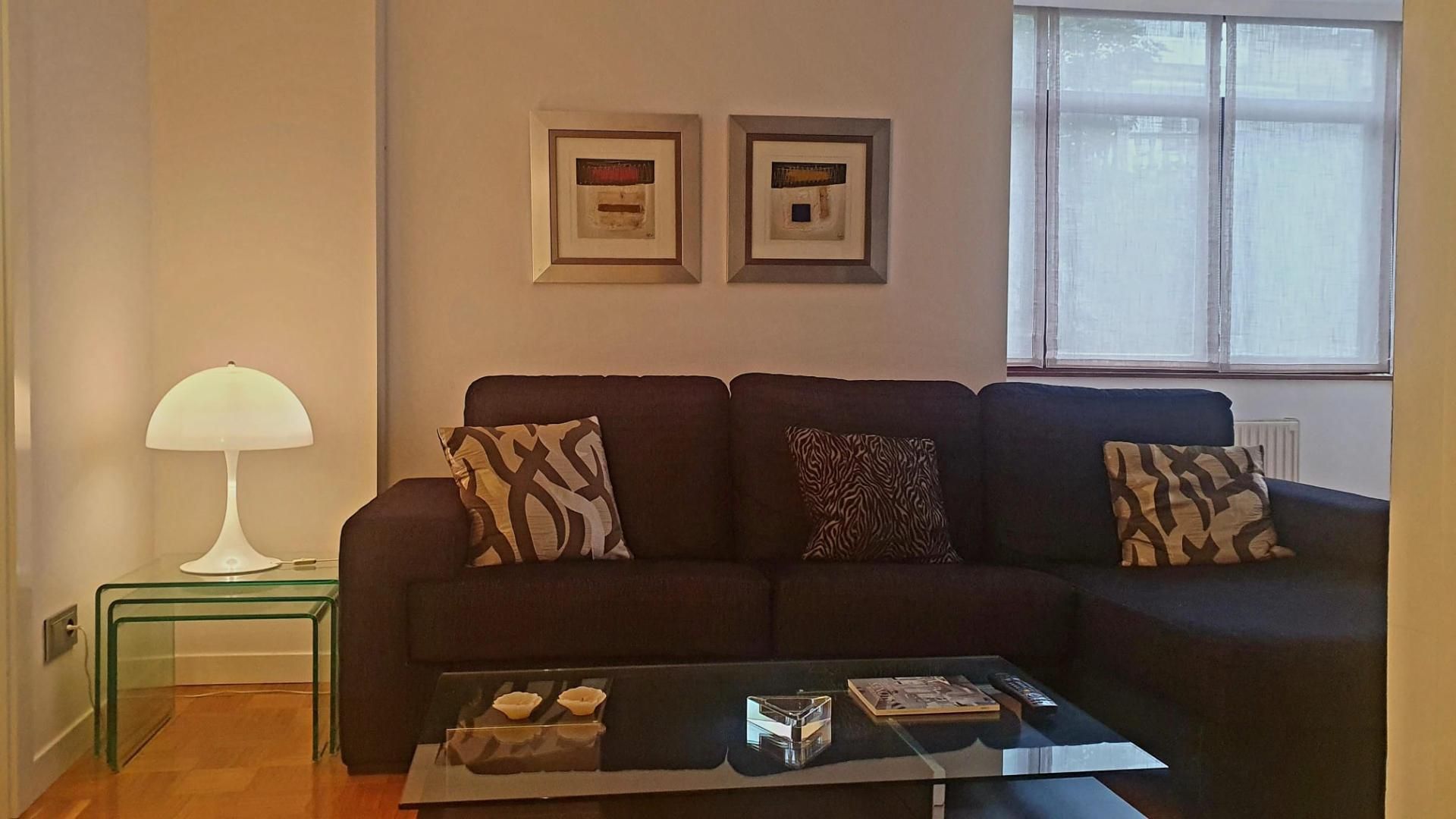 Sala de estar de Piso en venta en Ribadesella con Calefacción, Parquet y Trastero