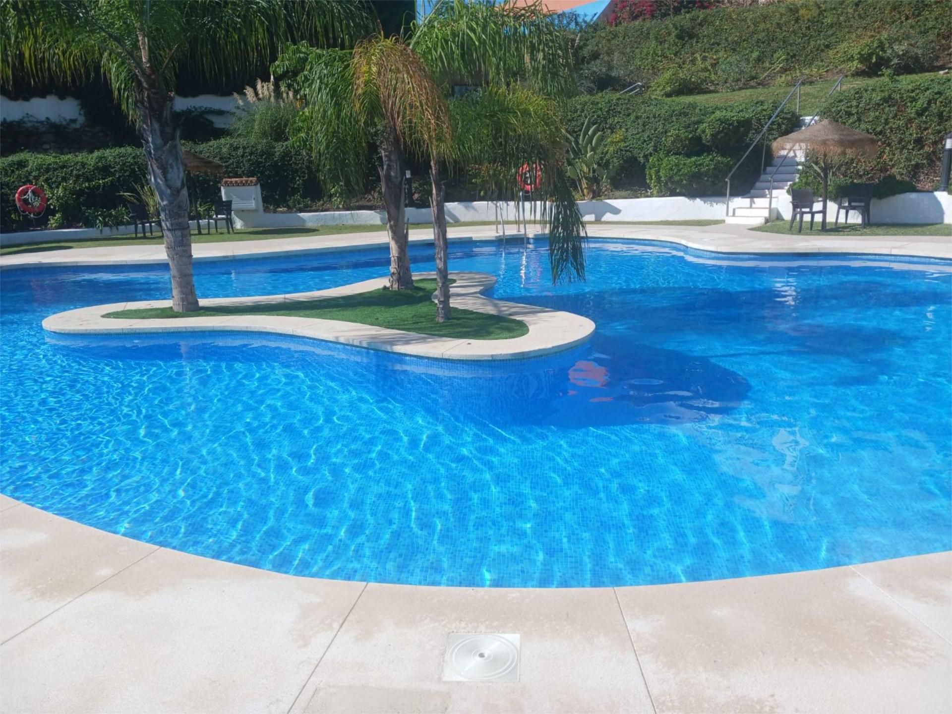 Swimming pool of Apartment for sale in Benalmádena  with Air Conditioner, Terrace and Swimming Pool