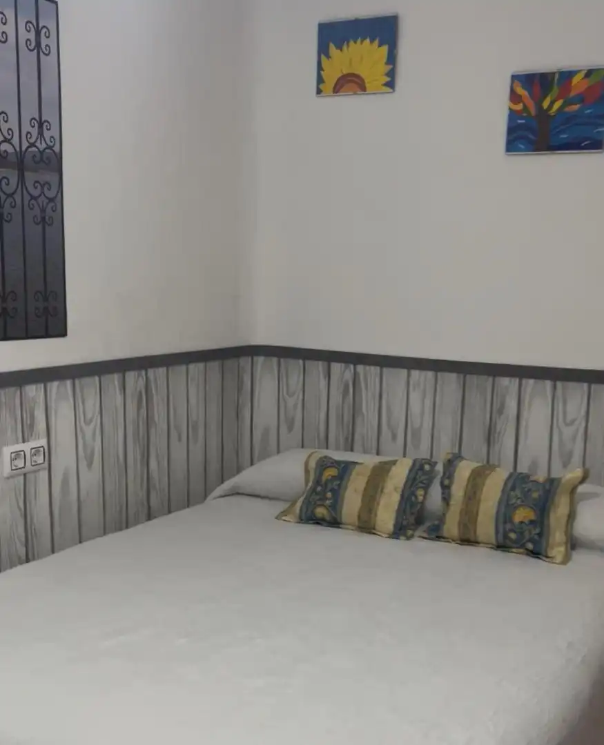 Dormitori de Casa adosada en venda en Alía amb Aire condicionat, Calefacció i Moblat