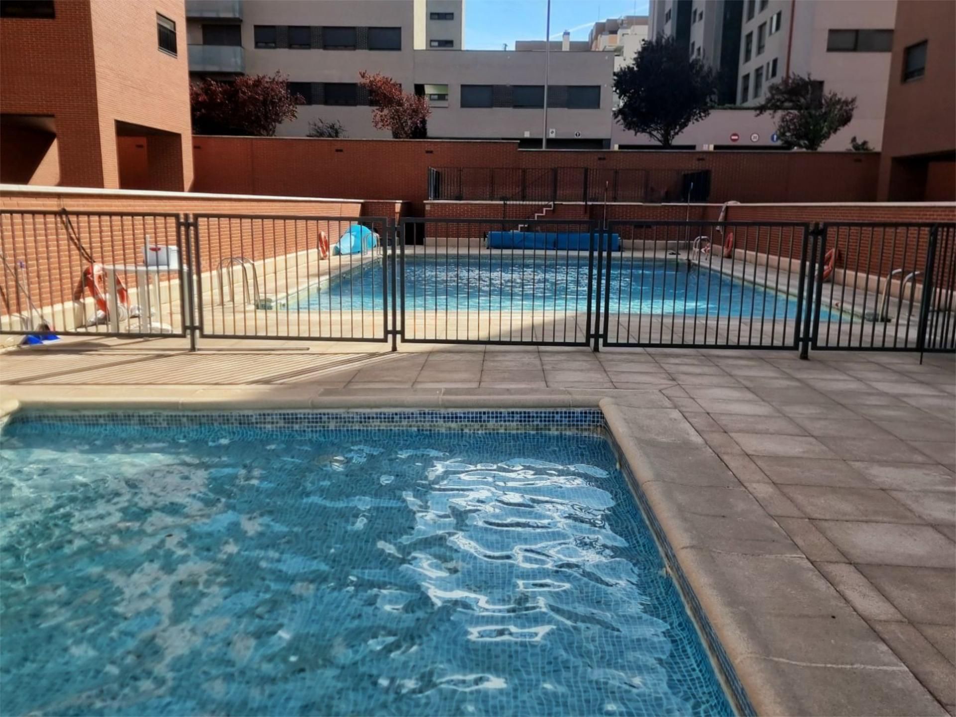 Swimming pool of Attic for sale in  Madrid Capital  with Air Conditioner, Heating and Storage room