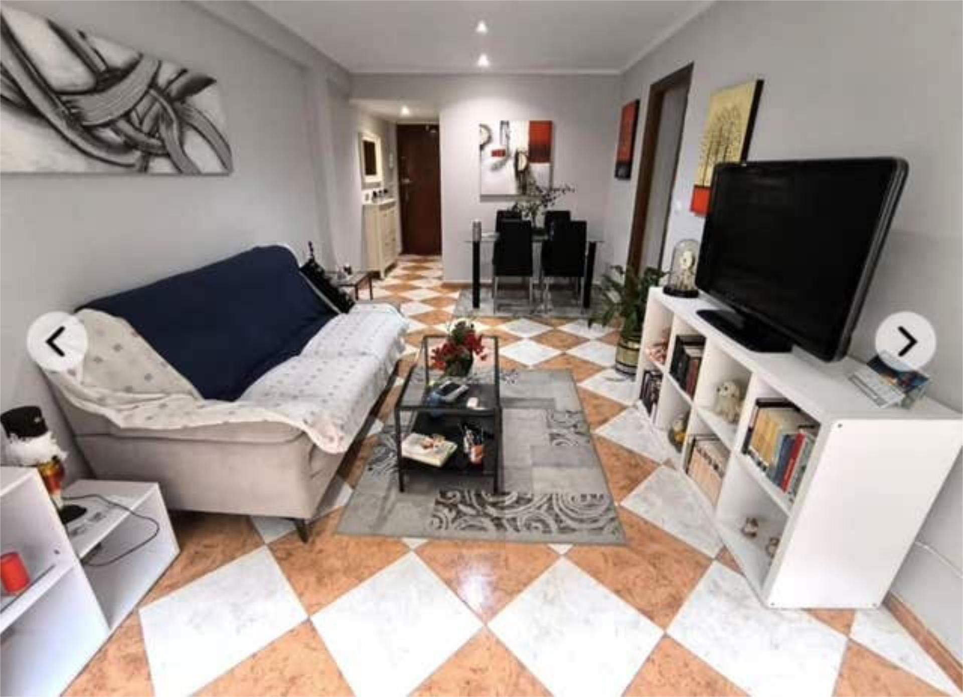 Sala de estar de Piso en venta en  Huelva Capital con Calefacción