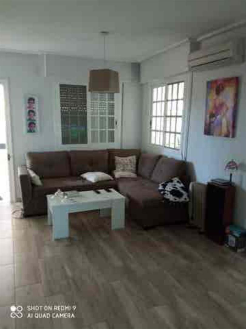 Wohnzimmer von Einfamilien-Reihenhaus zum Verkauf in Castellón de la Plana / Castelló de la Plana mit Heizung, Privatgarten und Terrasse