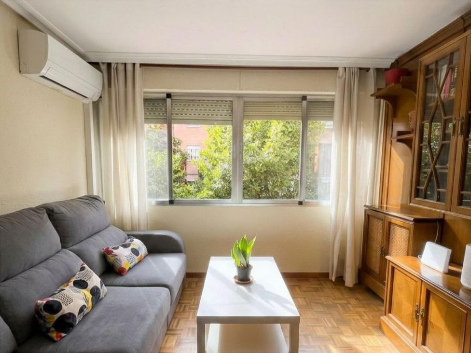Sala de estar de Piso en venta en  Madrid Capital con Aire acondicionado