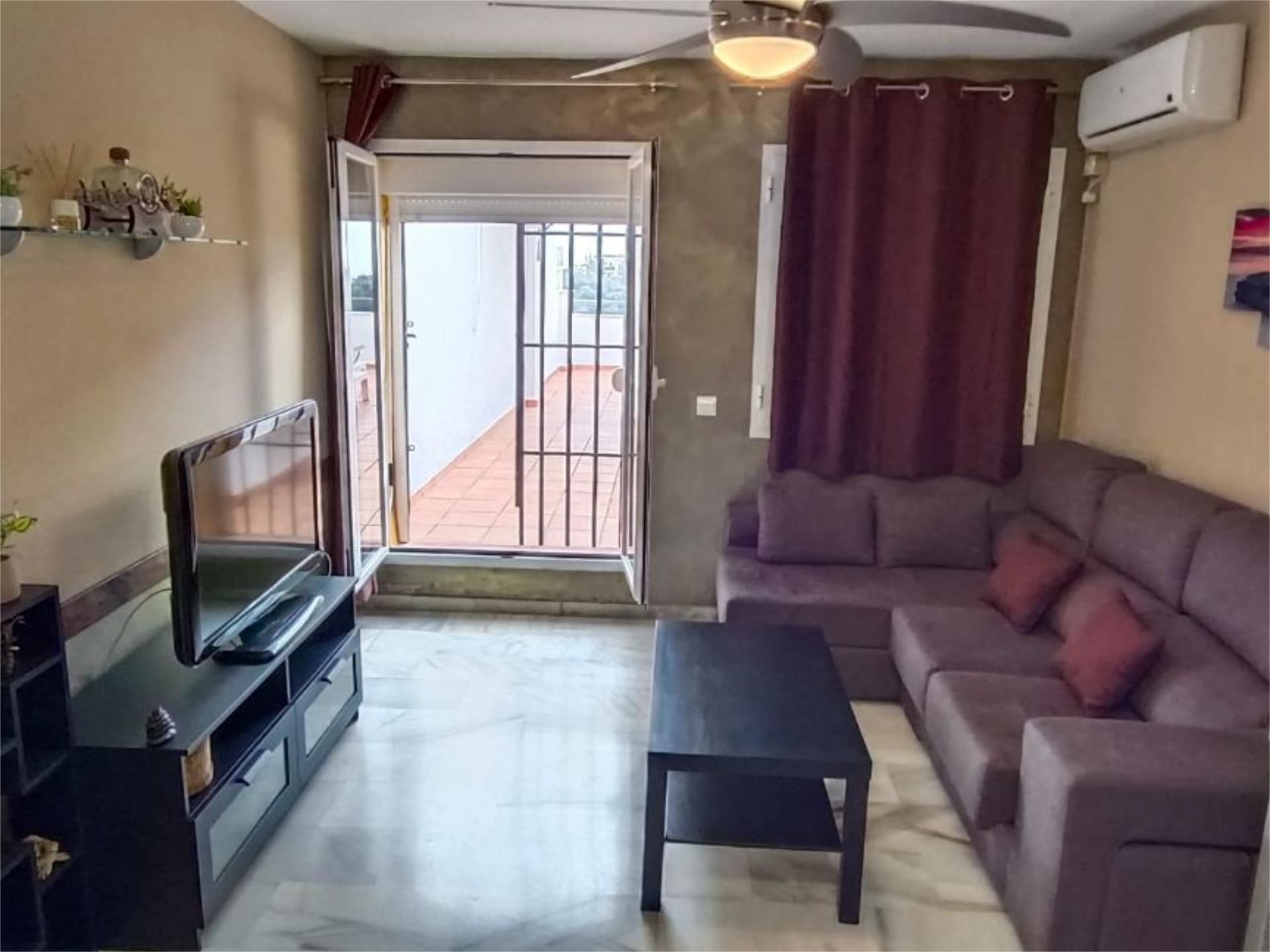 Sala de estar de Piso en venta en Estepona con Aire acondicionado, Terraza y Piscina