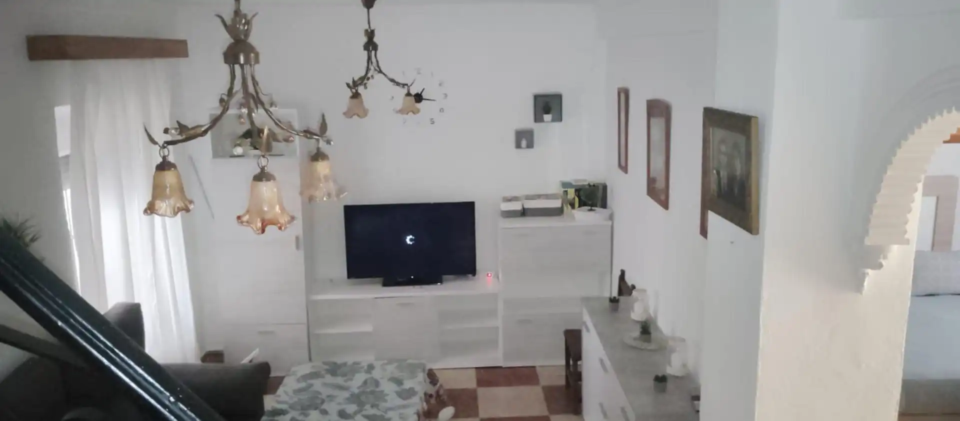 Sala d'estar de Casa adosada en venda en El Pedroso amb Terrassa, Traster i Moblat
