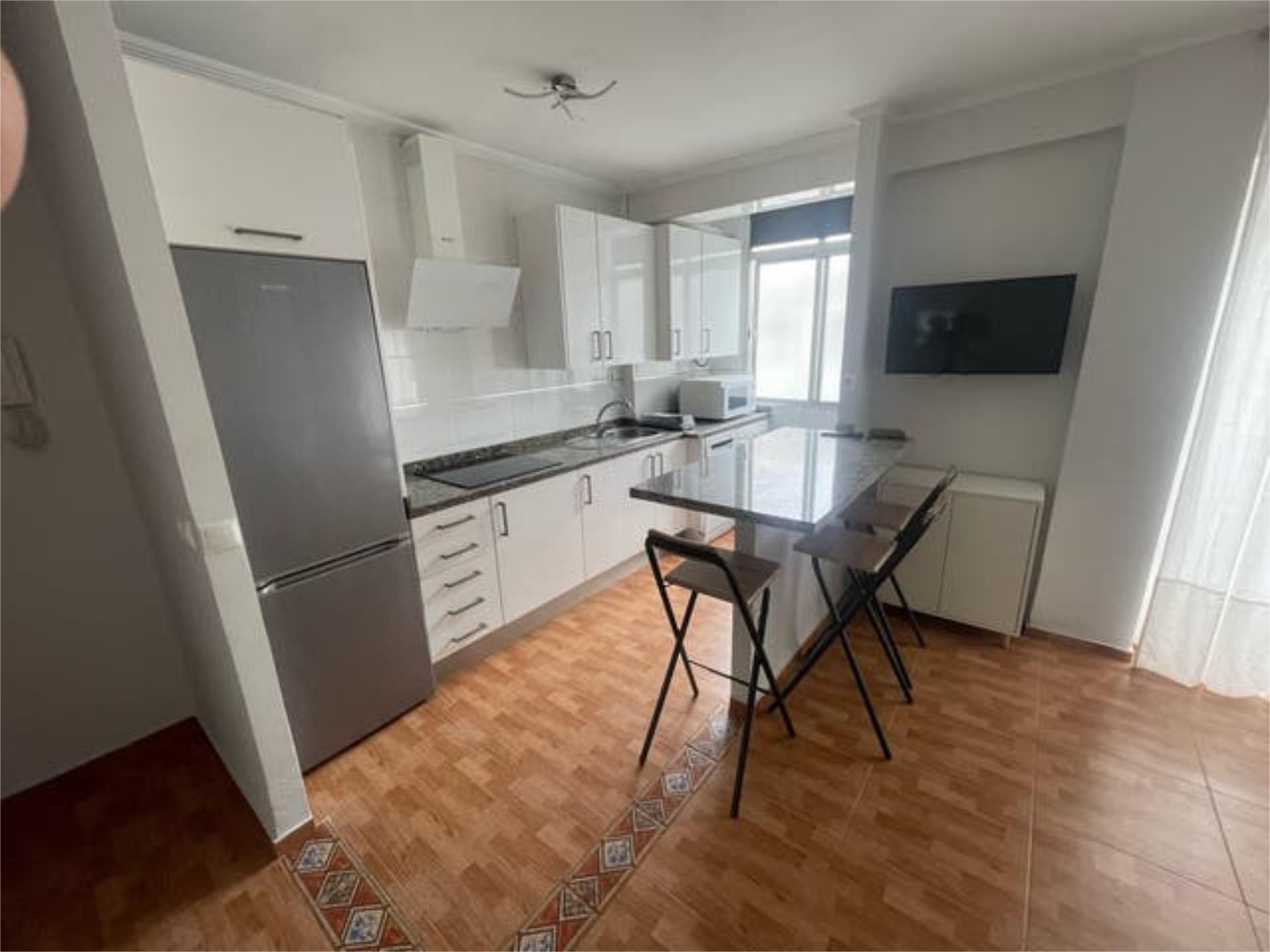 Cuina de Pis de lloguer en  Huelva Capital amb Terrassa i Moblat