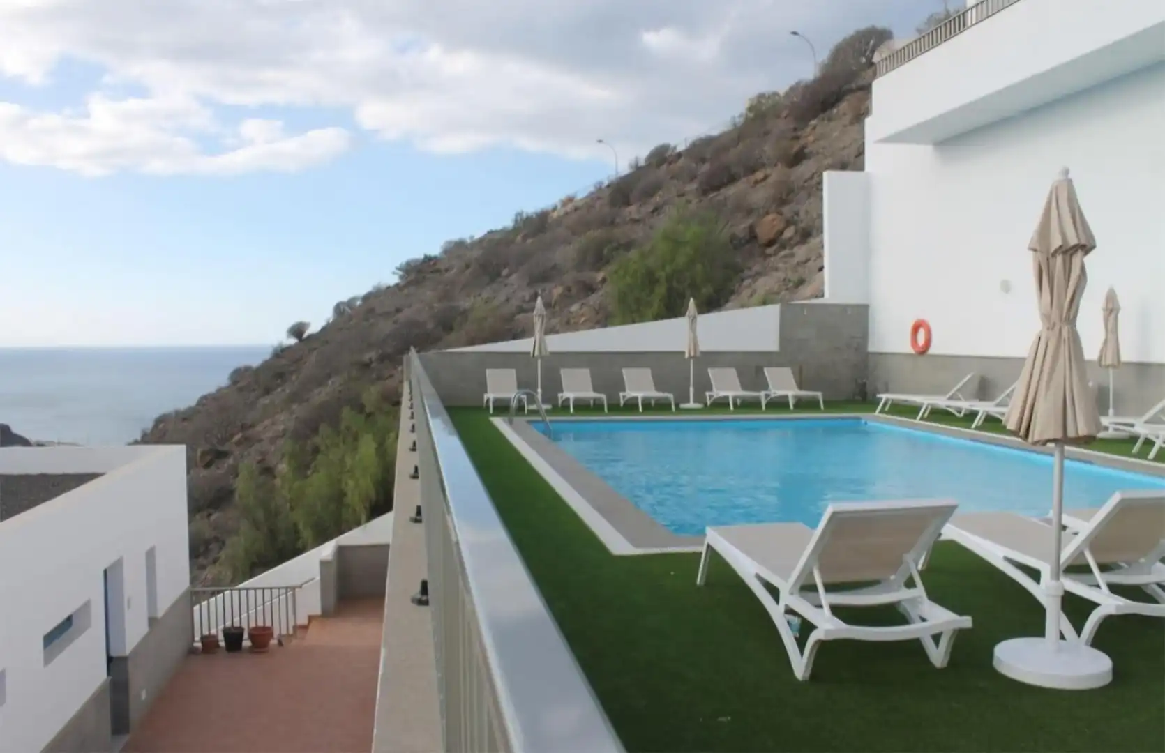 Piso en venta en Calle Roque de los Muchachos, 21, Puerto Rico Piscina de Piso en venta en Mogán con Aire acondicionado, Calefacción y Jardín privado