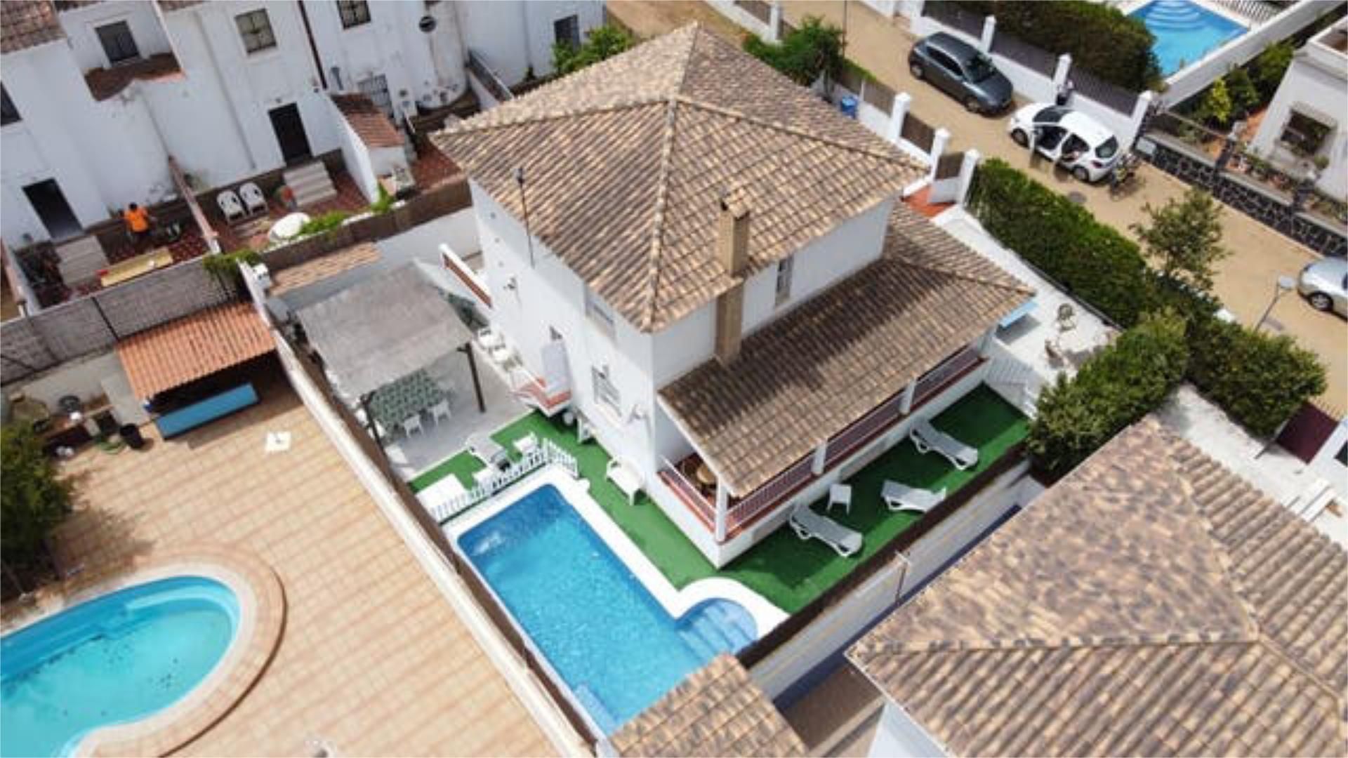 Vista exterior de Casa adosada en venda en Isla Cristina amb Calefacció, Jardí privat i Terrassa