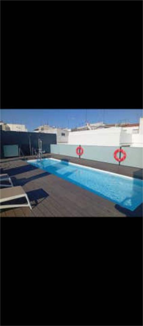 Piscina de Àtic en venda en  Sevilla Capital amb Calefacció, Jardí privat i Terrassa