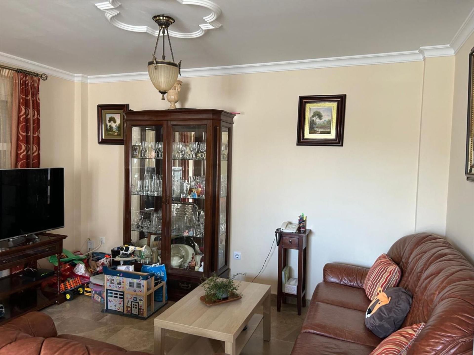 Sala d'estar de Casa adosada en venda en Chiclana de la Frontera