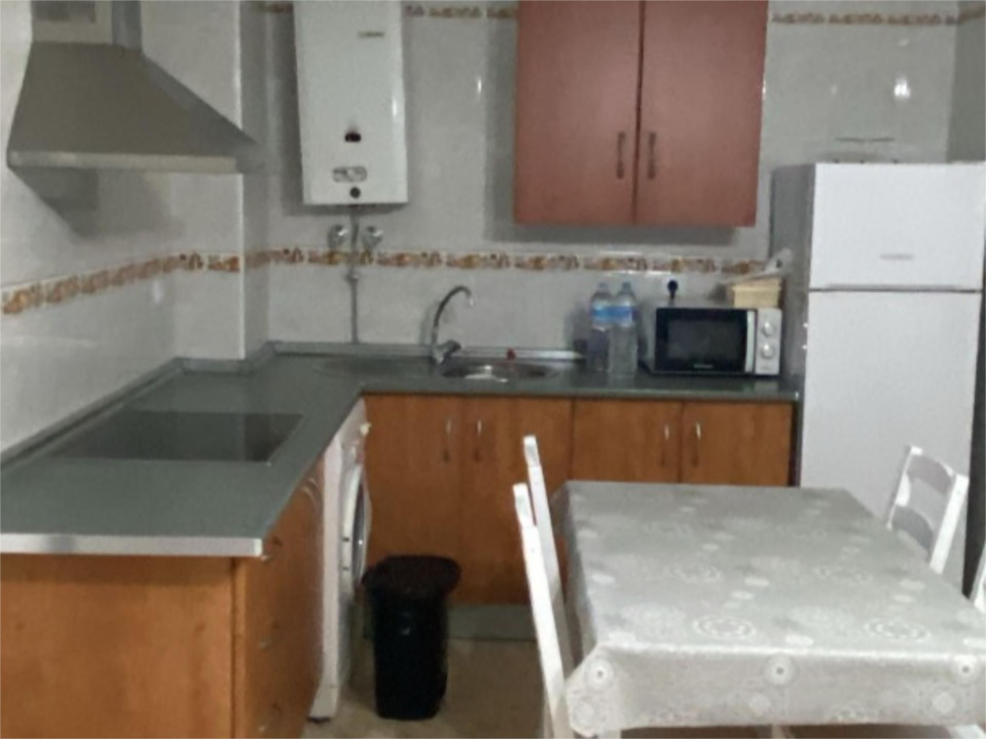 Kitchen of Flat for sale in Chipiona  with Air Conditioner, Furnished and Balcony