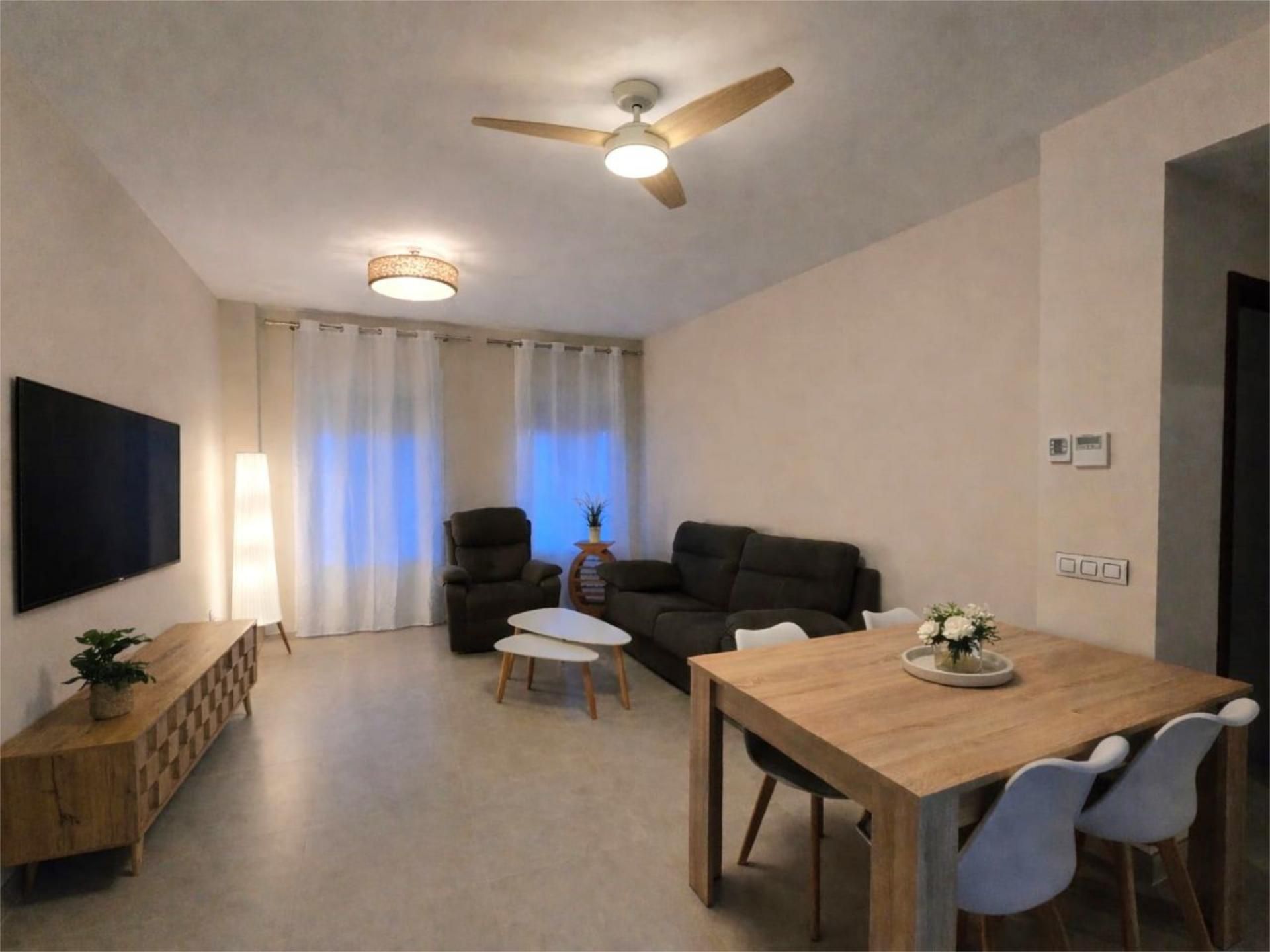 Living room of Flat to rent in Sanlúcar la Mayor  with Air Conditioner, Heating and Furnished