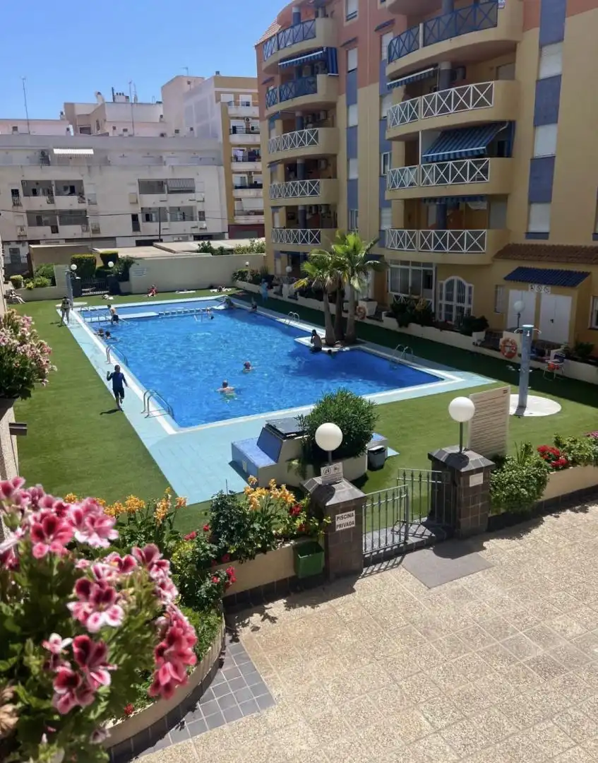 Swimming pool of Flat for sale in Torrevieja  with Air Conditioner, Heating and Swimming Pool
