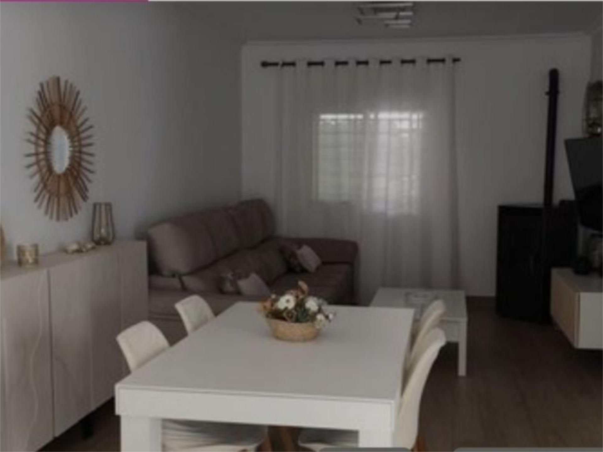 Sala de estar de Casa adosada en venta en Alcalá de Guadaira con Aire acondicionado, Terraza y Piscina