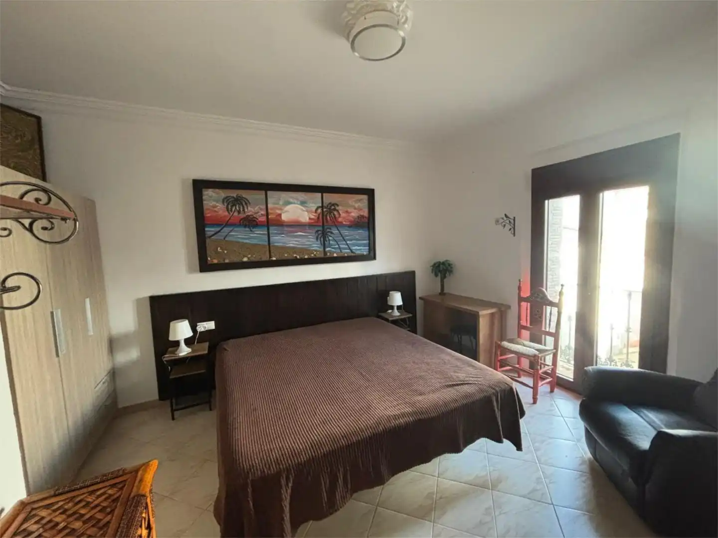 Schlafzimmer von Wohnung zum Verkauf in Carrión de los Céspedes mit Klimaanlage, Heizung und Privatgarten
