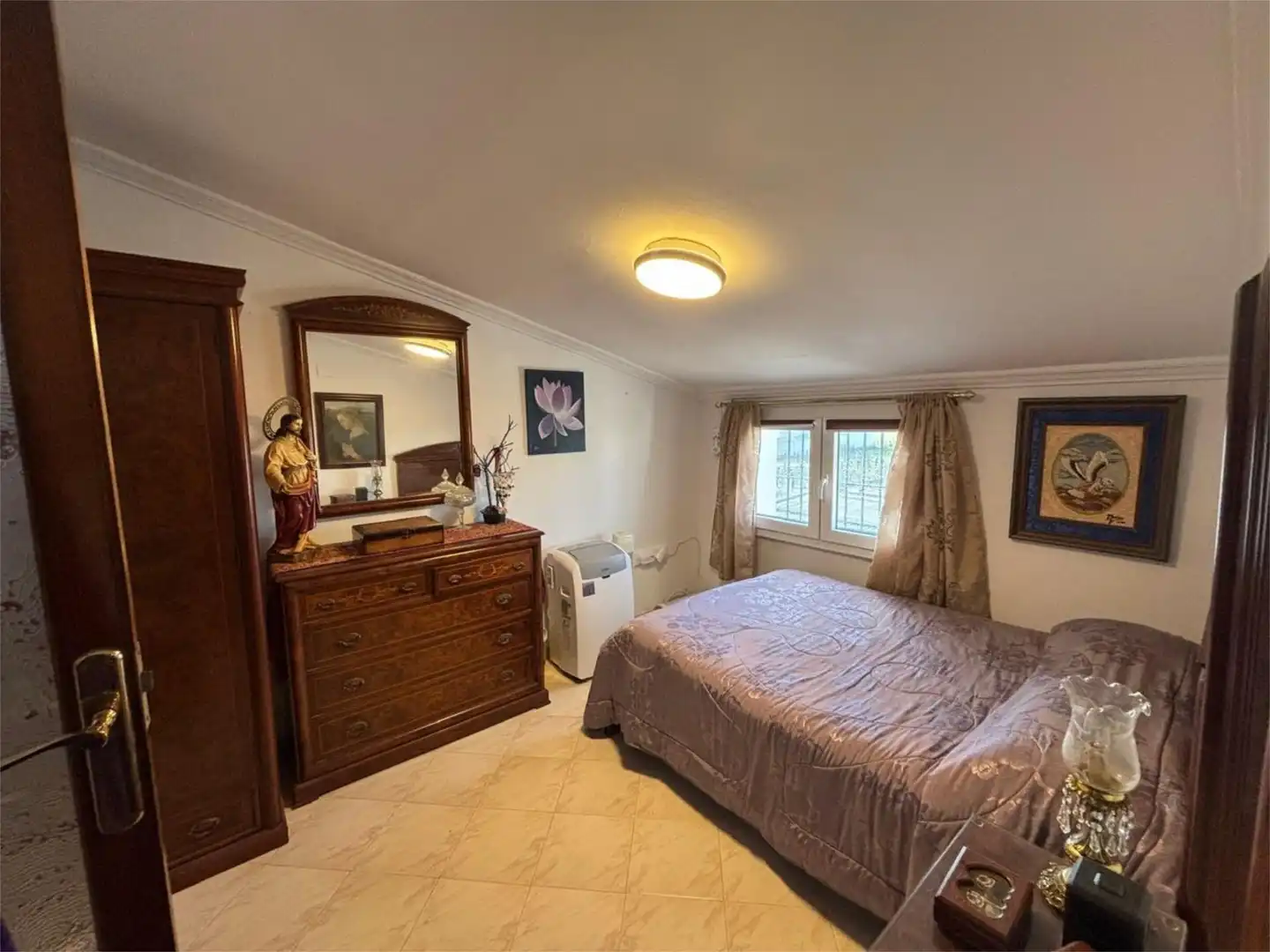 Schlafzimmer von Wohnung zum Verkauf in Carrión de los Céspedes mit Klimaanlage, Heizung und Privatgarten