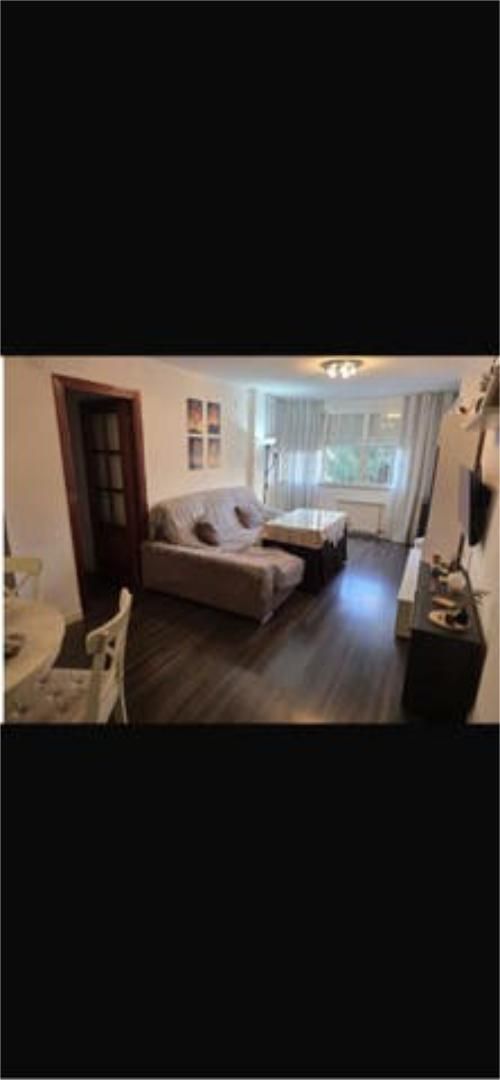 Living room of Flat for sale in  Sevilla Capital  with Heating, Private garden and Swimming Pool
