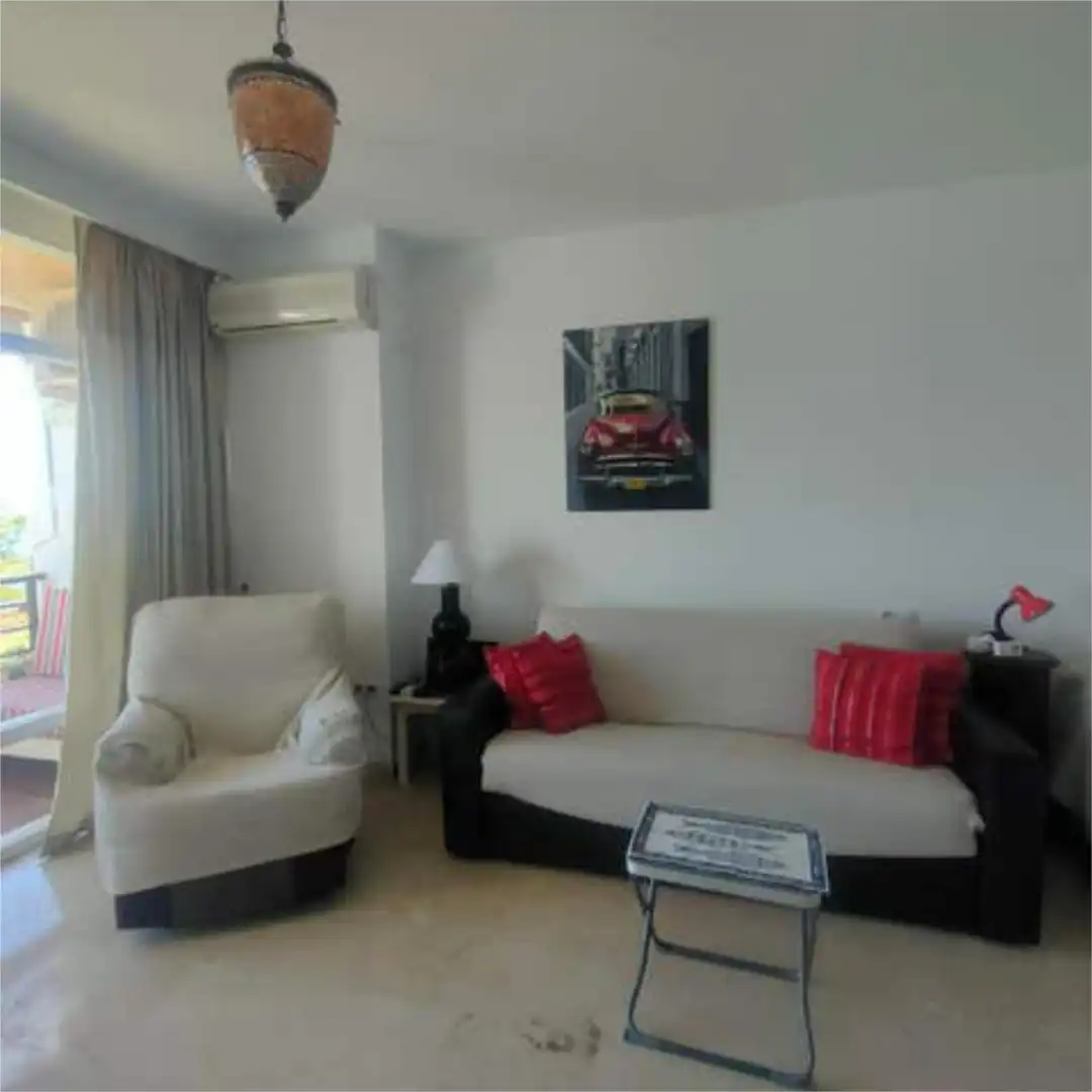 Apartamento en venta en El Bajondillo Sala de estar de Apartamento en venta en Torremolinos con Terraza y Piscina